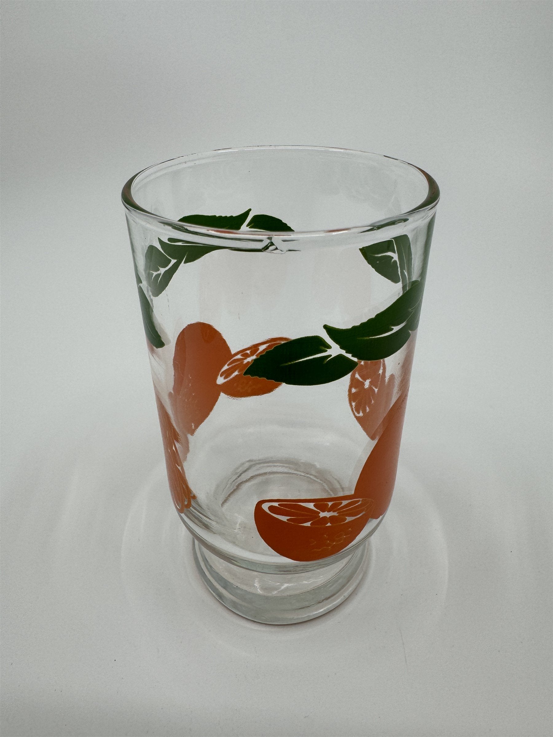 Vintage Anchor Hocking Oranges Juice Glass /w Green Leaf Border Flat *Chip*