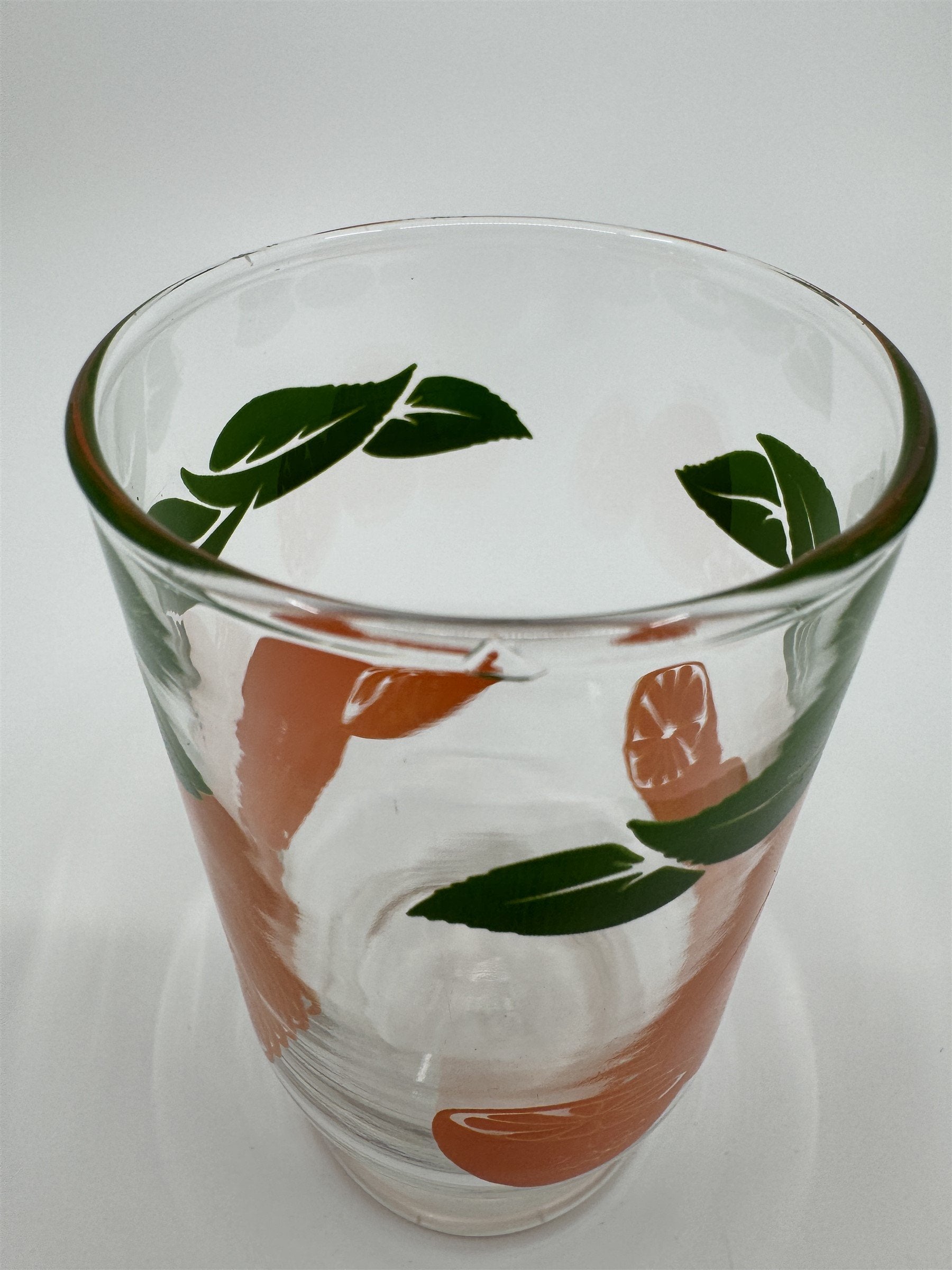 Vintage Anchor Hocking Oranges Juice Glass /w Green Leaf Border Flat *Chip*