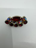 Vintage Red and Iridescent Rhinestone Accented Clip On Brooch