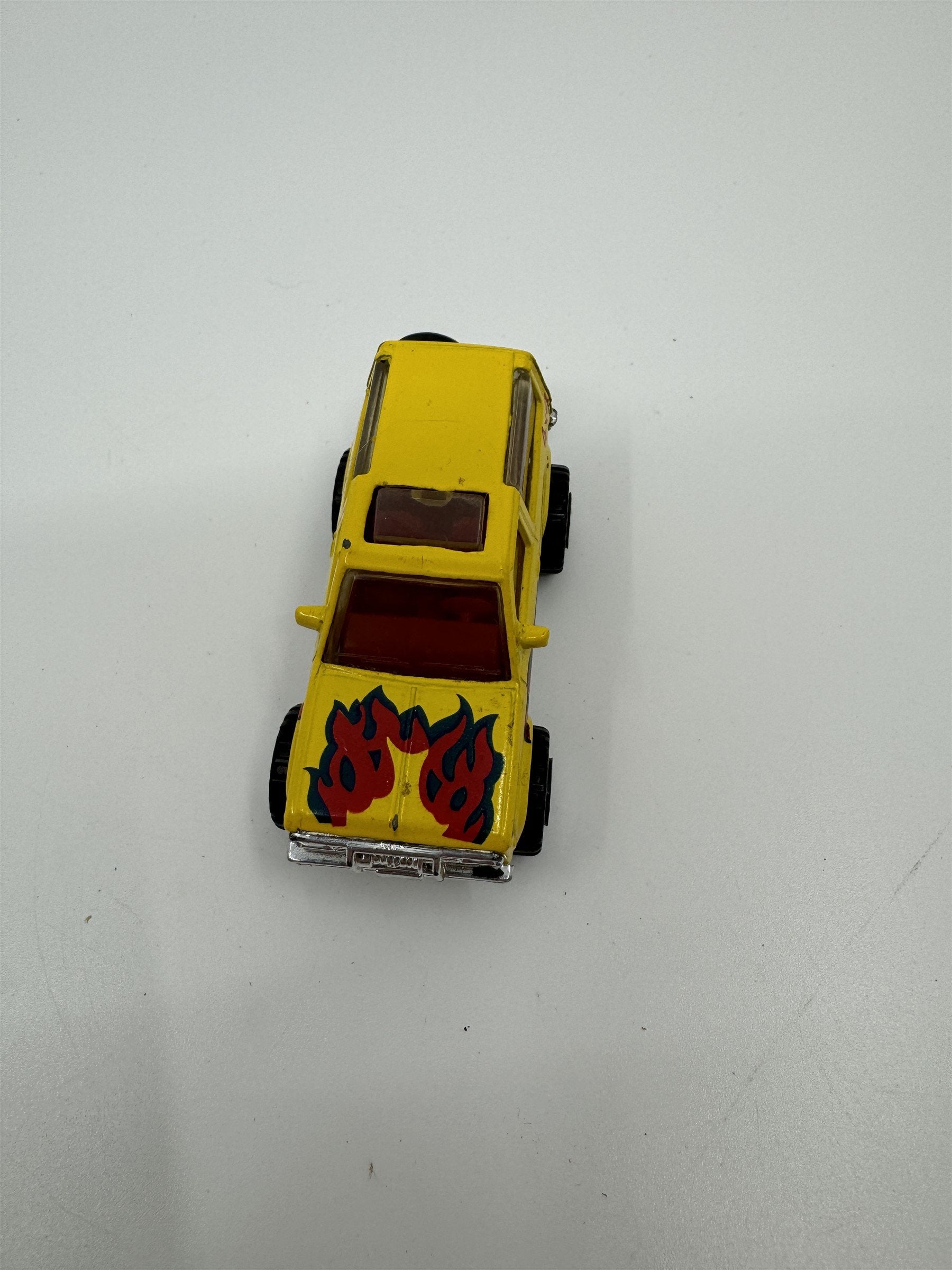 Vintage Matchbox 1987 Ford Bronco II 4x4 Yellow /w Red Flames 2-dr Truck
