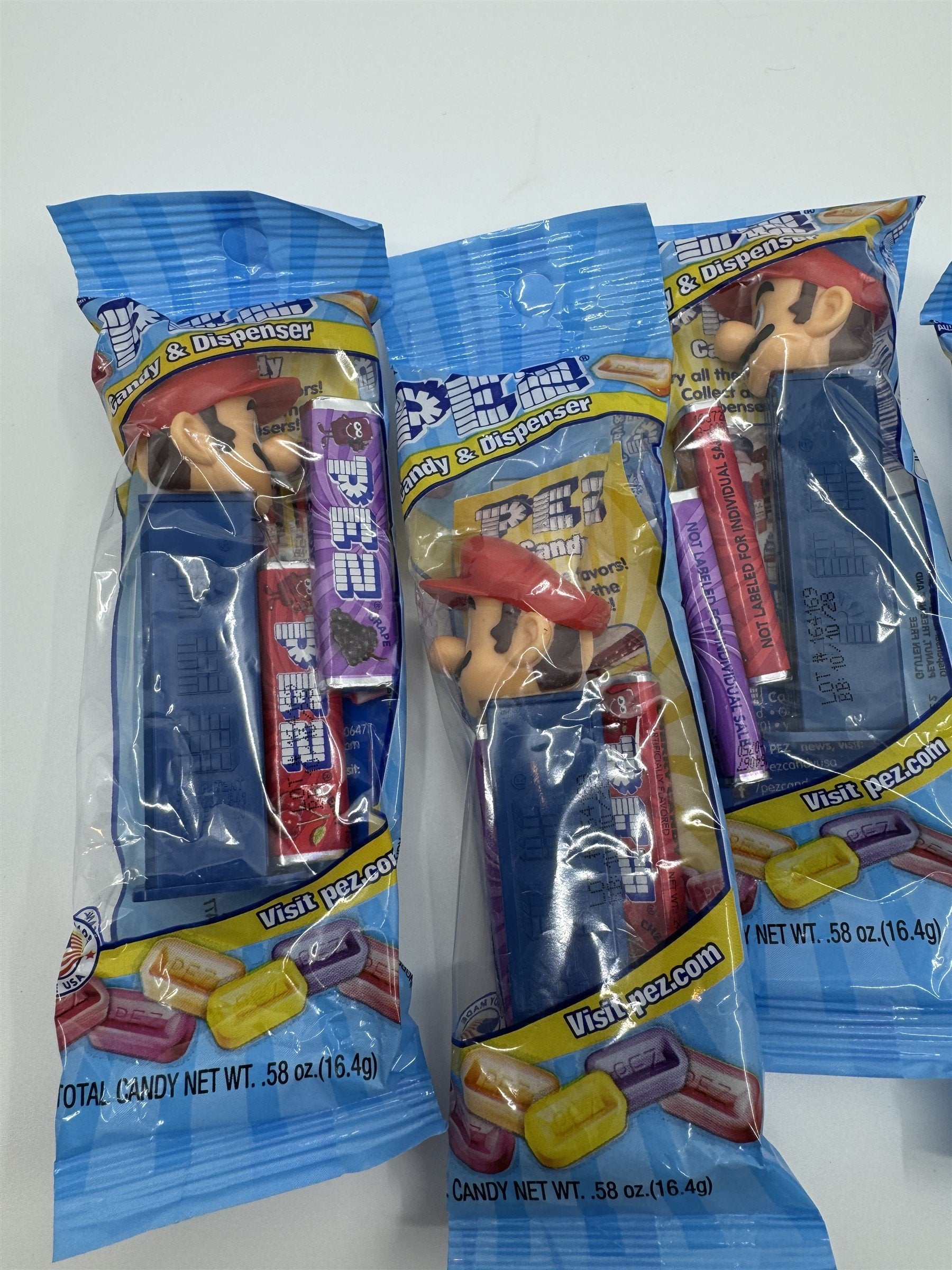 Lot of 6 Super Smash Brothers Pez Dispensers - 4x Mario & 2x Luigi NEW Exp 10/28
