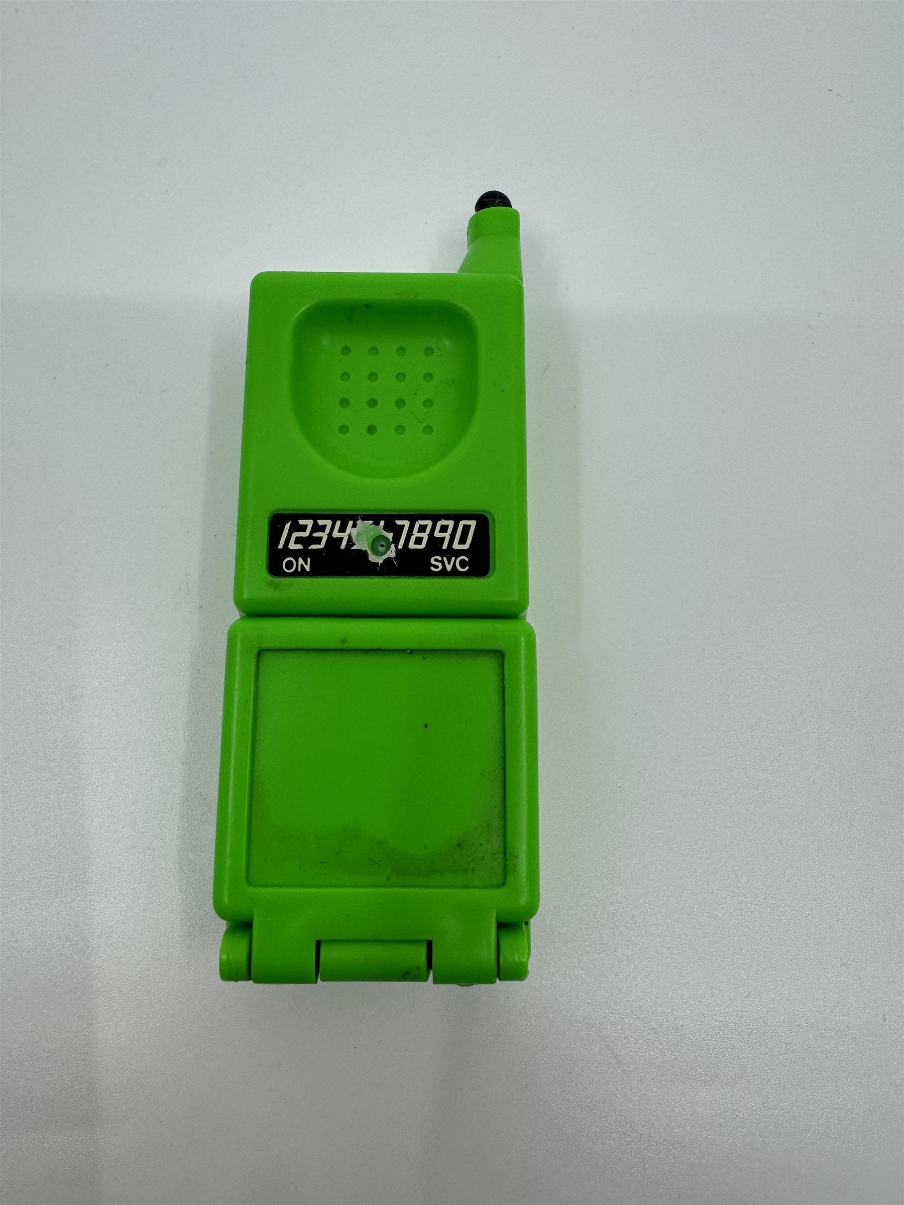 Vintage Toy Cellphone Prank Water Gun Self-Squirter Green Plastic Resin Toy