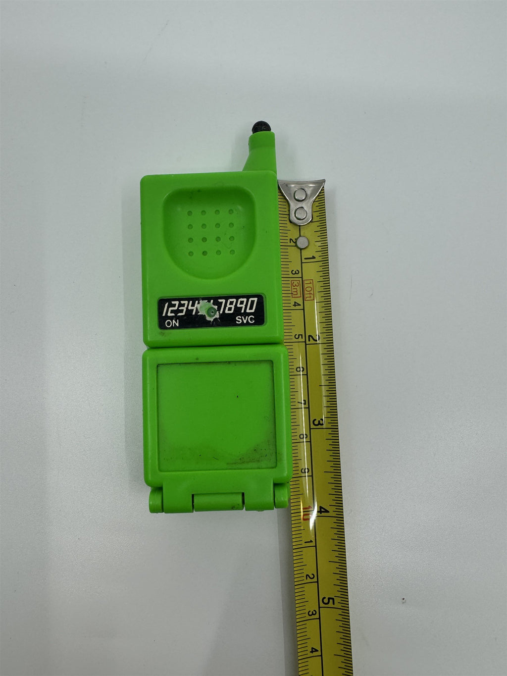 Vintage Toy Cellphone Prank Water Gun Self-Squirter Green Plastic Resin Toy