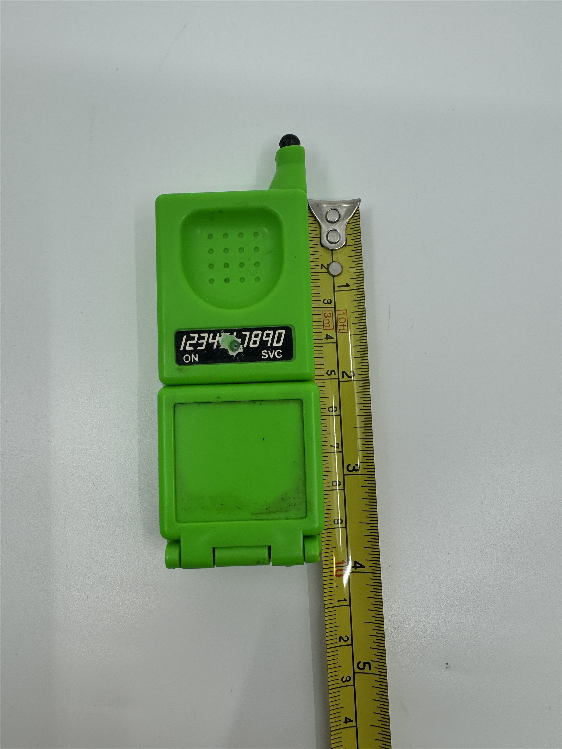Vintage Toy Cellphone Prank Water Gun Self-Squirter Green Plastic Resin Toy