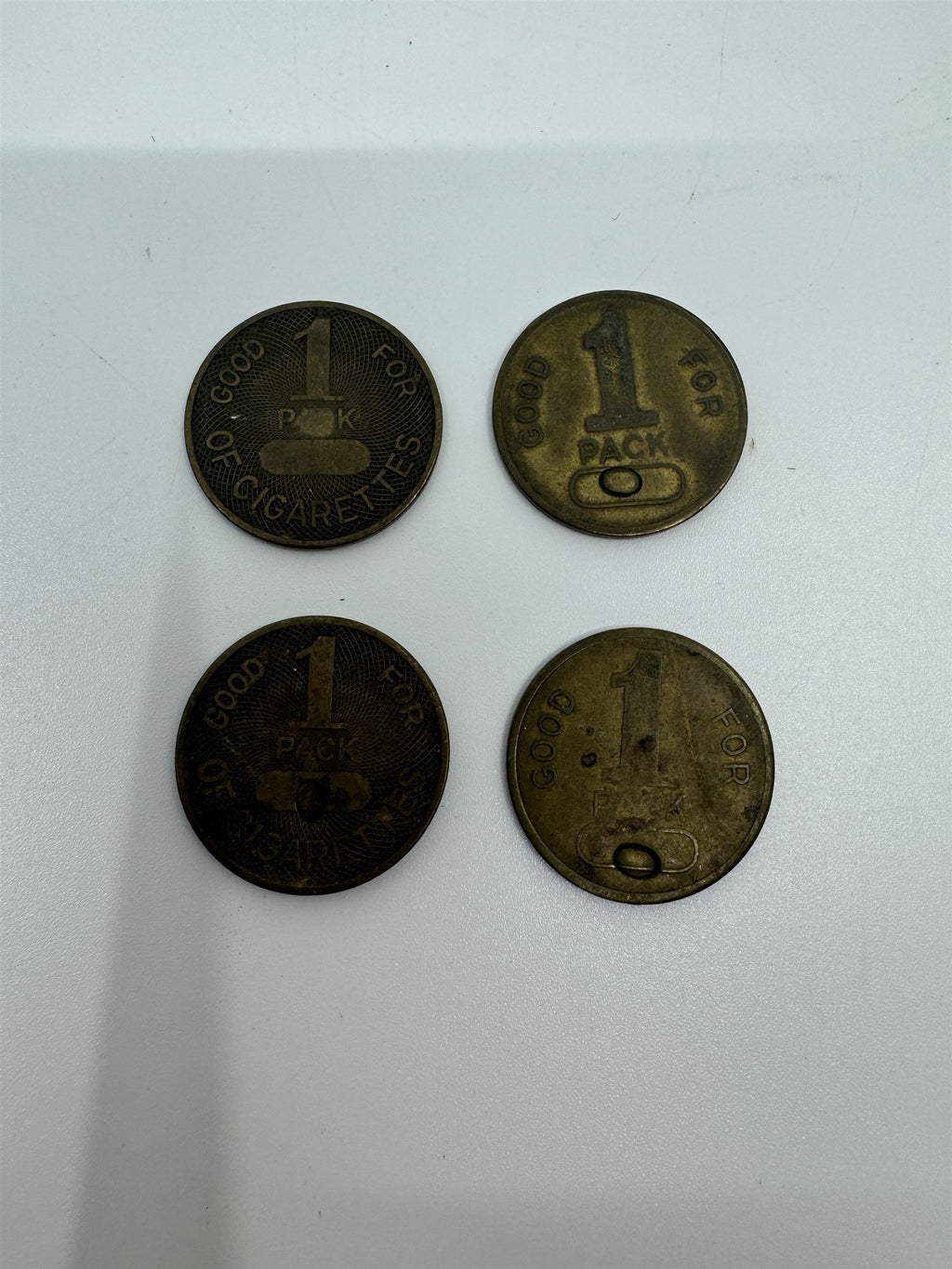 Set of 4 Vintage Good for 1 Pack Cigarette Machine Tokens Brass Novelty Coins