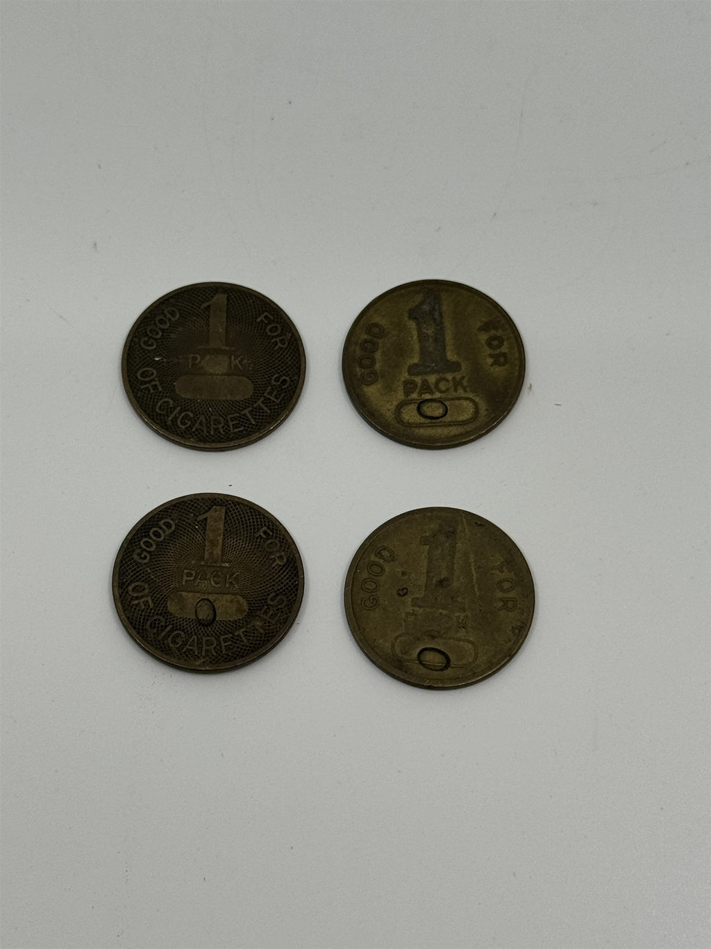 Set of 4 Vintage Good for 1 Pack Cigarette Machine Tokens Brass Novelty Coins