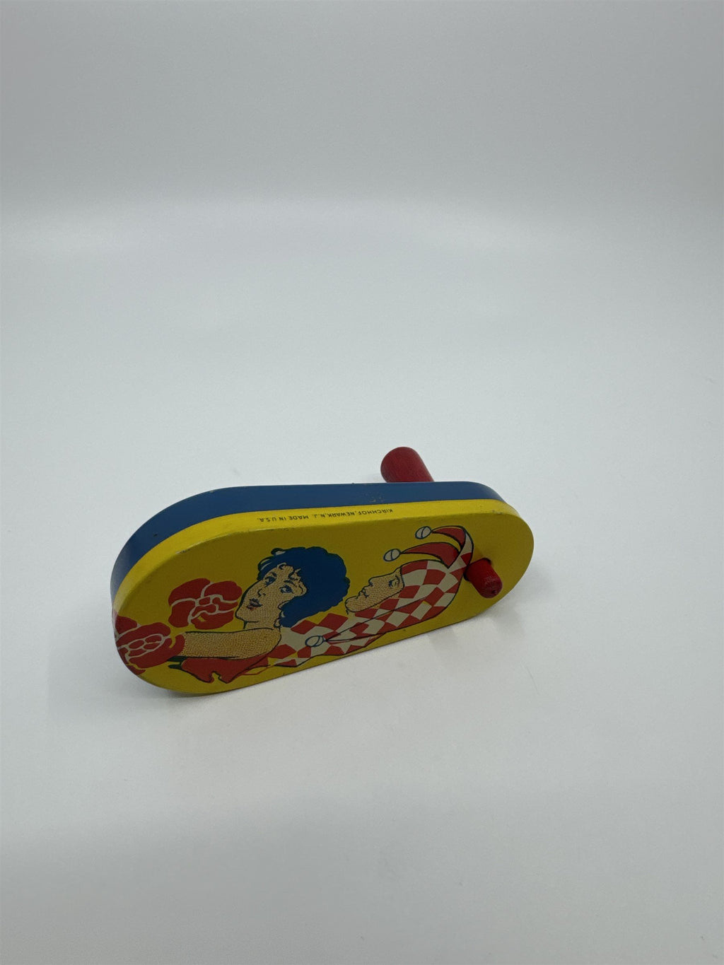 Kirchhof 1950s Tin Litho Winding Noisemaker Newark NJ USA Joker and Woman