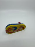 Kirchhof 1950s Tin Litho Winding Noisemaker Newark NJ USA Joker and Woman