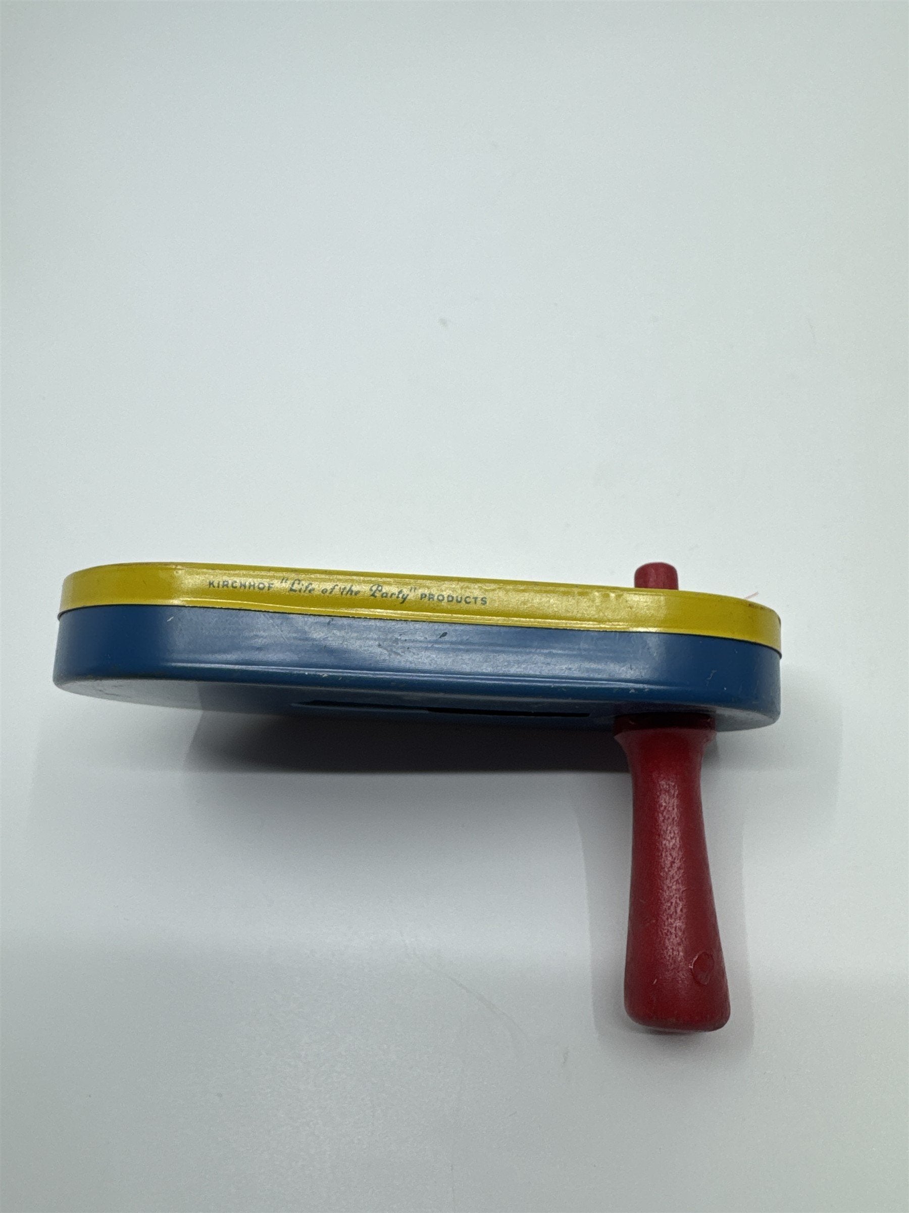 Kirchhof 1950s Tin Litho Winding Noisemaker Newark NJ USA Joker and Woman
