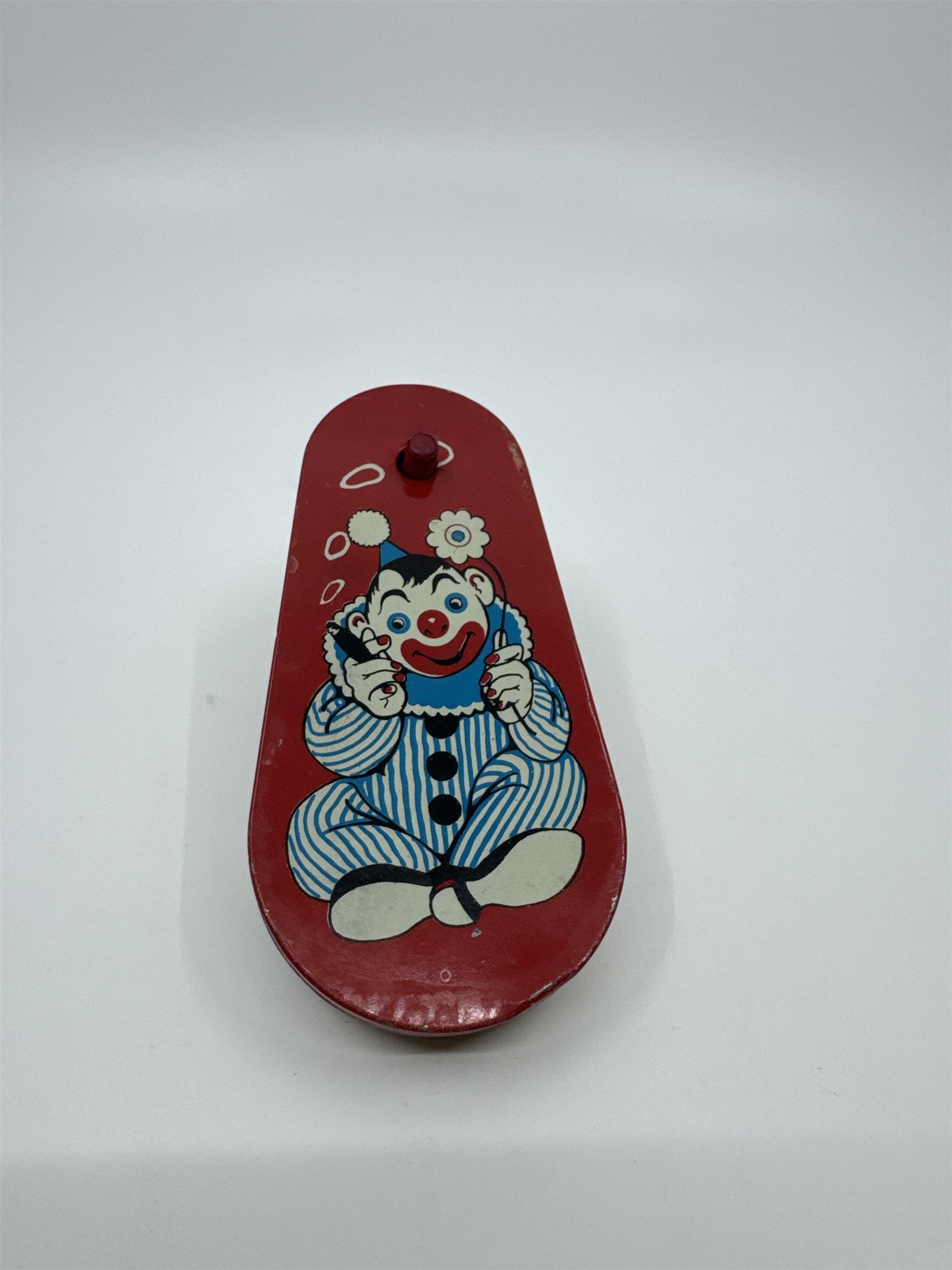 Vintage 1950s Tin Litho Winding Noisemaker USA Cigar Rings Smoking Clown Flower