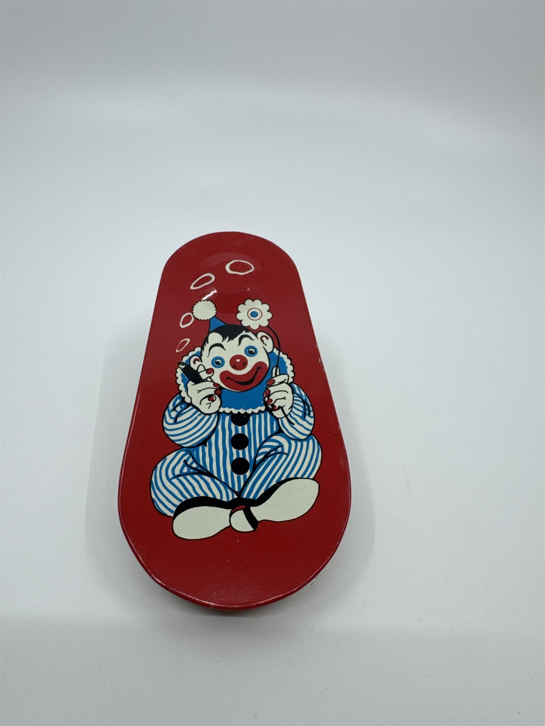 Vintage 1950s Tin Litho Winding Noisemaker USA Cigar Rings Smoking Clown Flower