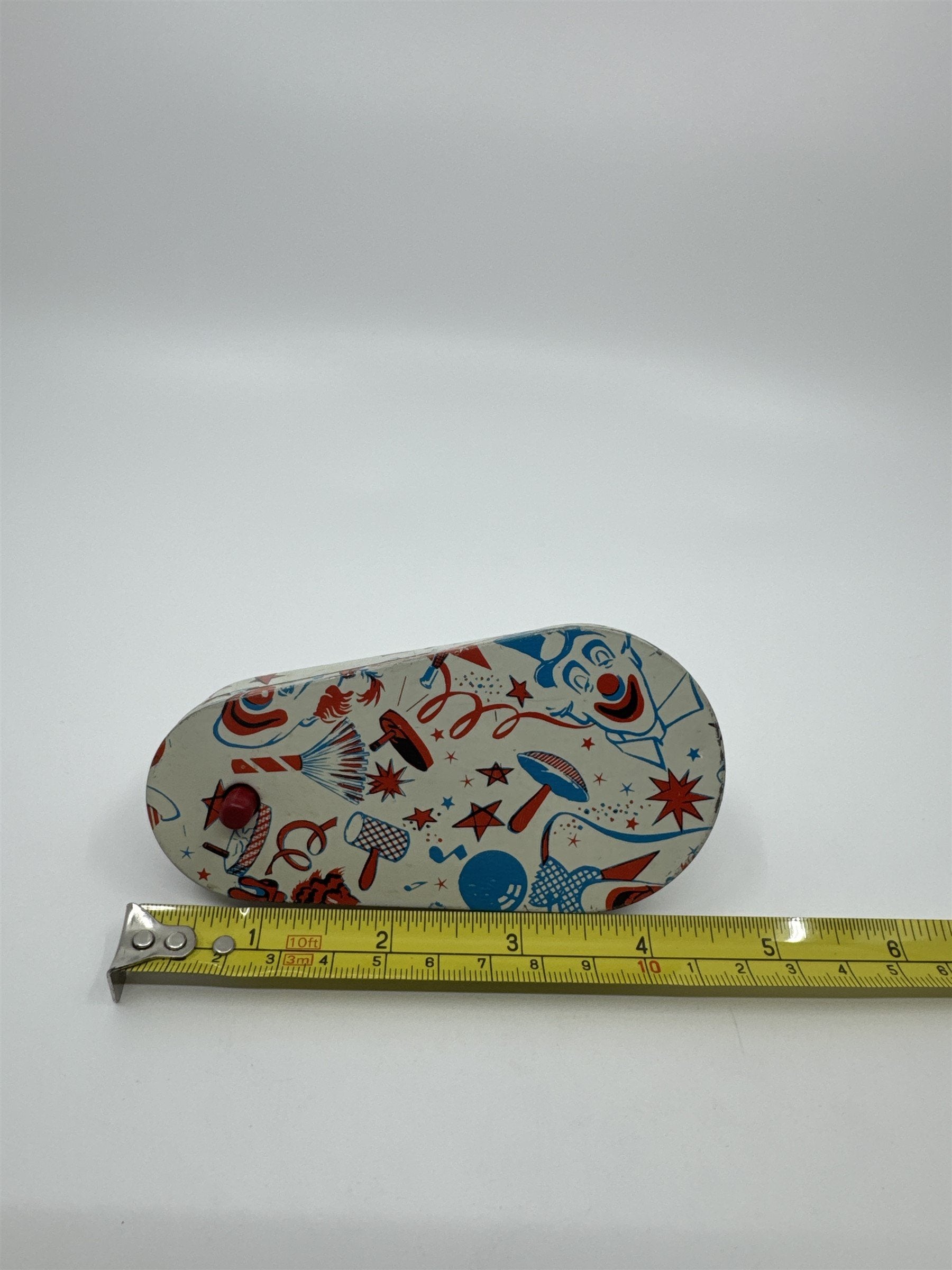 Vintage 1950s Tin Litho Winding Noisemaker USA Clowns and Bells Bangs Booms Pow