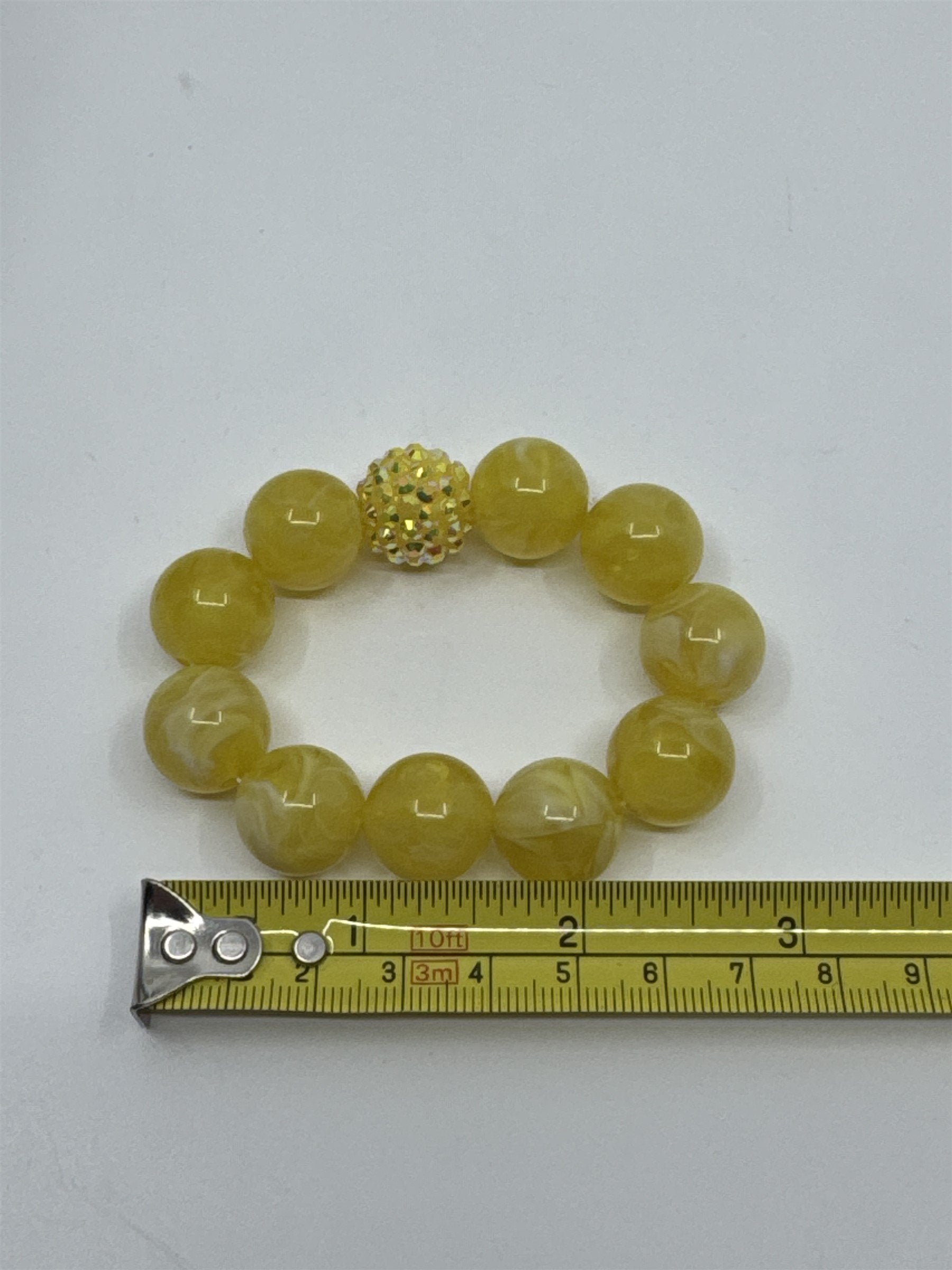 Vintage Yellow and White Marbled Hard Plastic Lucite? Beaded Bracelet Shiny Ball