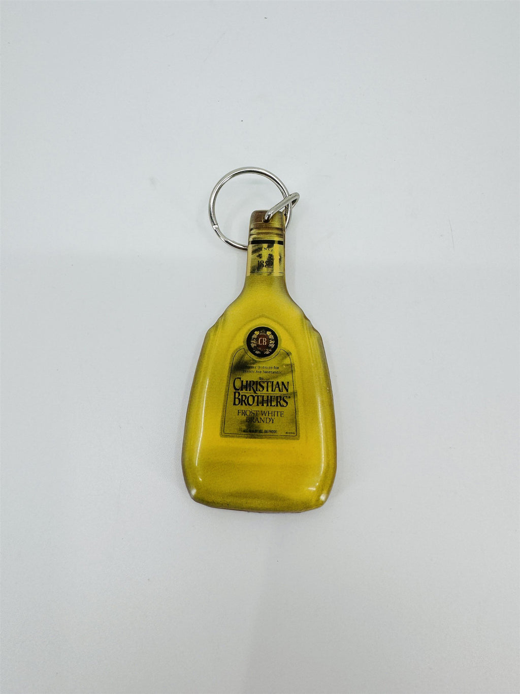 Vintage Christian Brothers Frost White Brandy Promotional Enamel Keychain