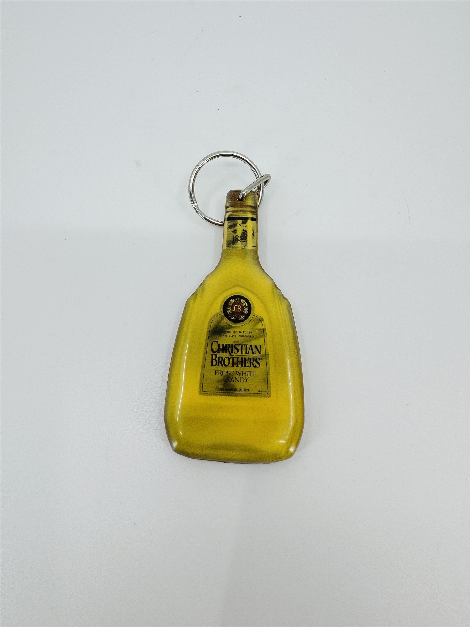 Vintage Christian Brothers Frost White Brandy Promotional Enamel Keychain