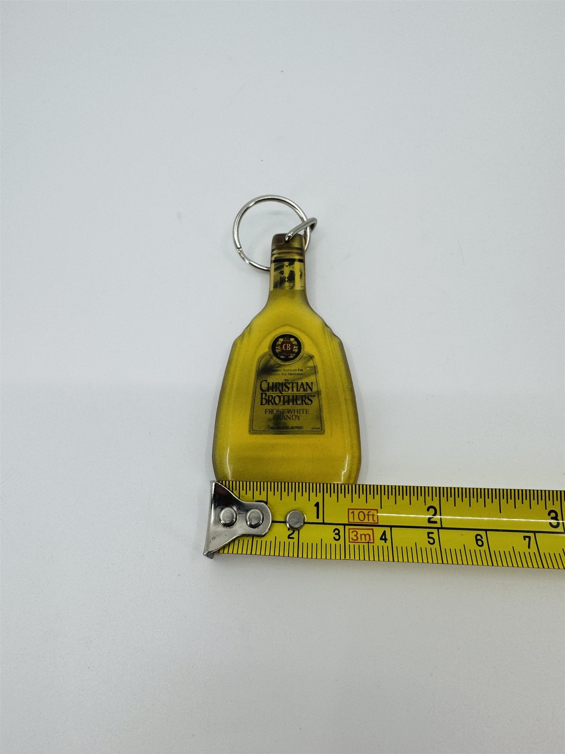 Vintage Christian Brothers Frost White Brandy Promotional Enamel Keychain