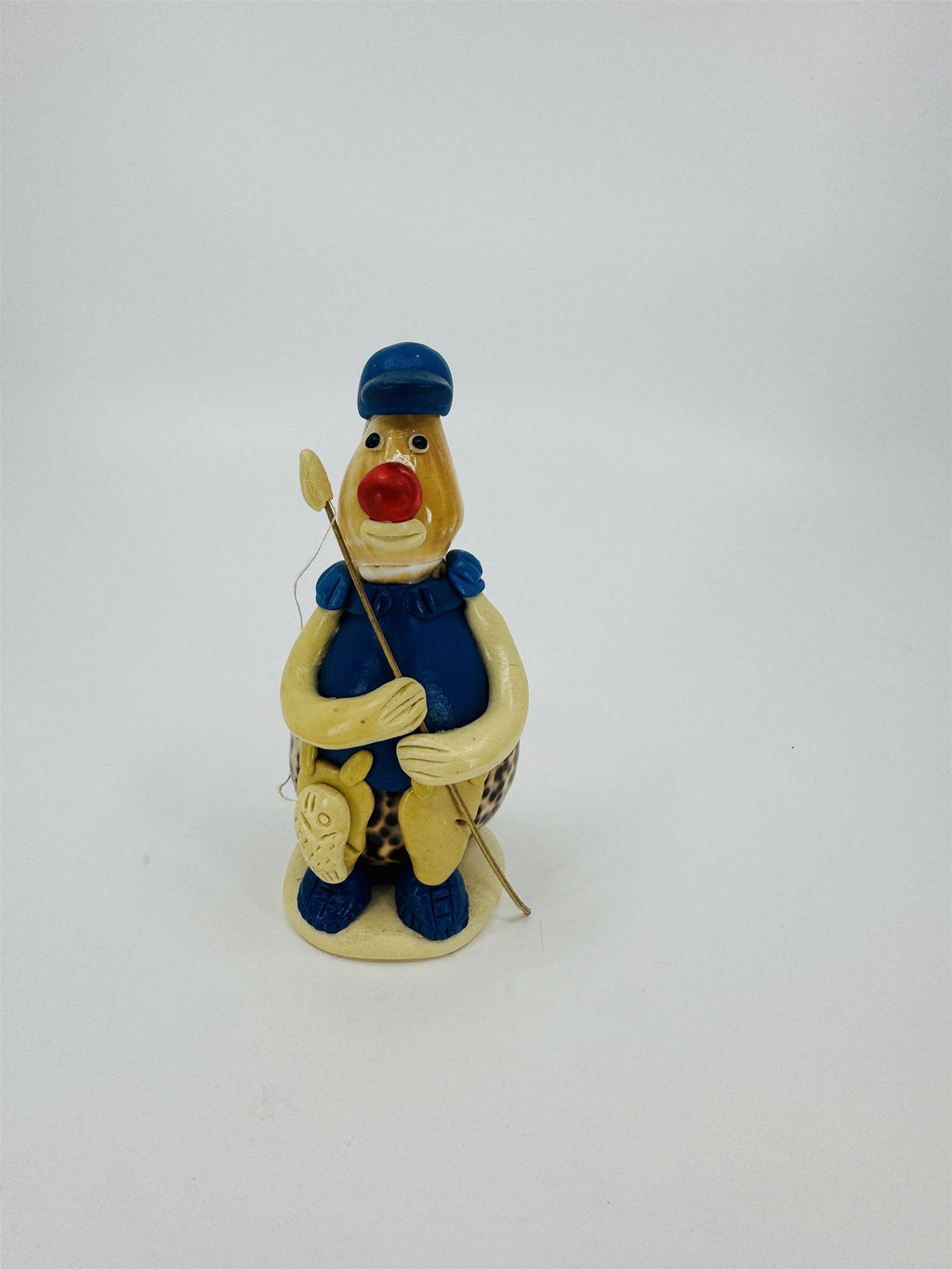 Vintage Sea Shell Art Figurine Fisherman Blue Shirt Made in Philippines