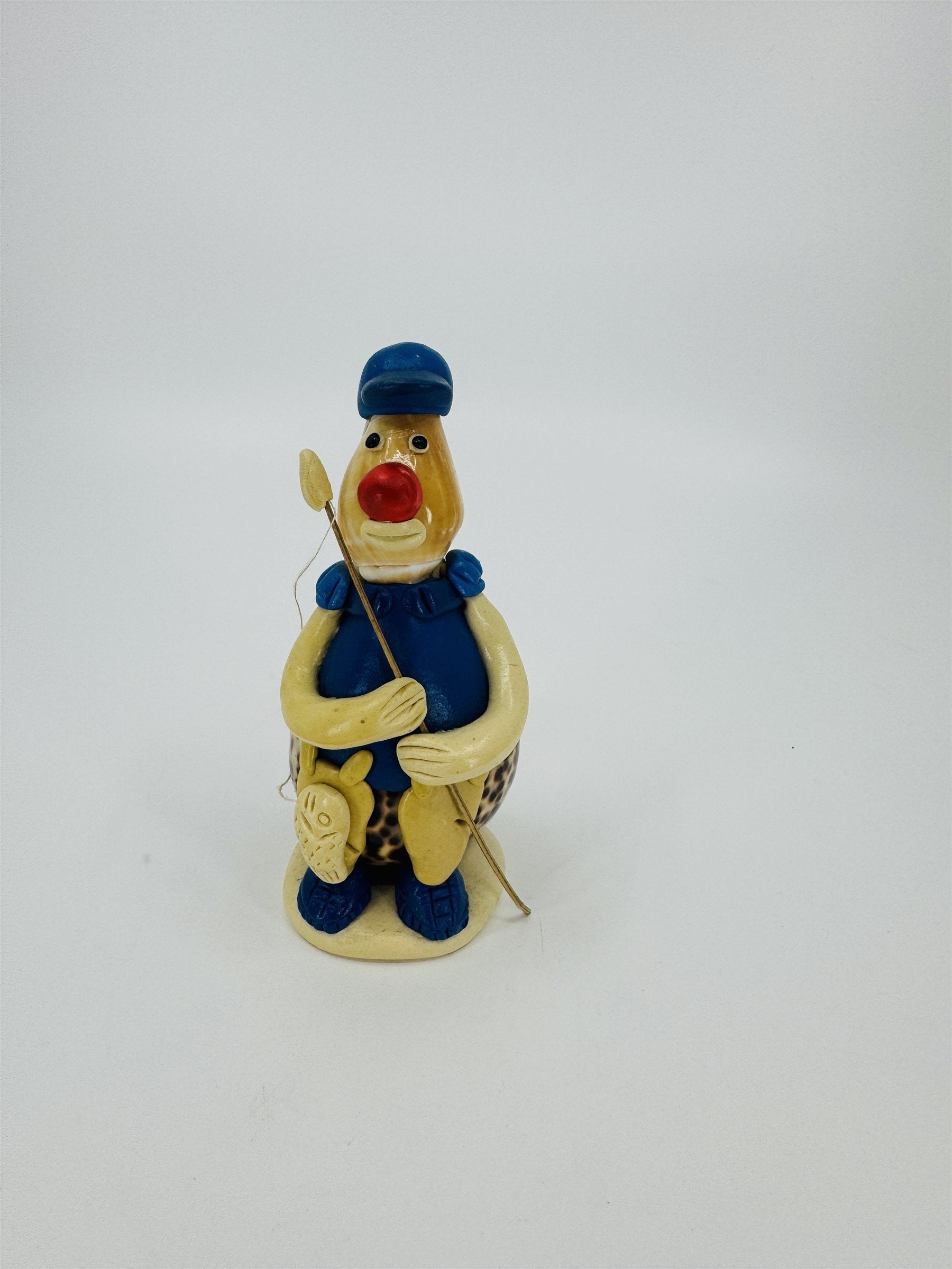 Vintage Sea Shell Art Figurine Fisherman Blue Shirt Made in Philippines