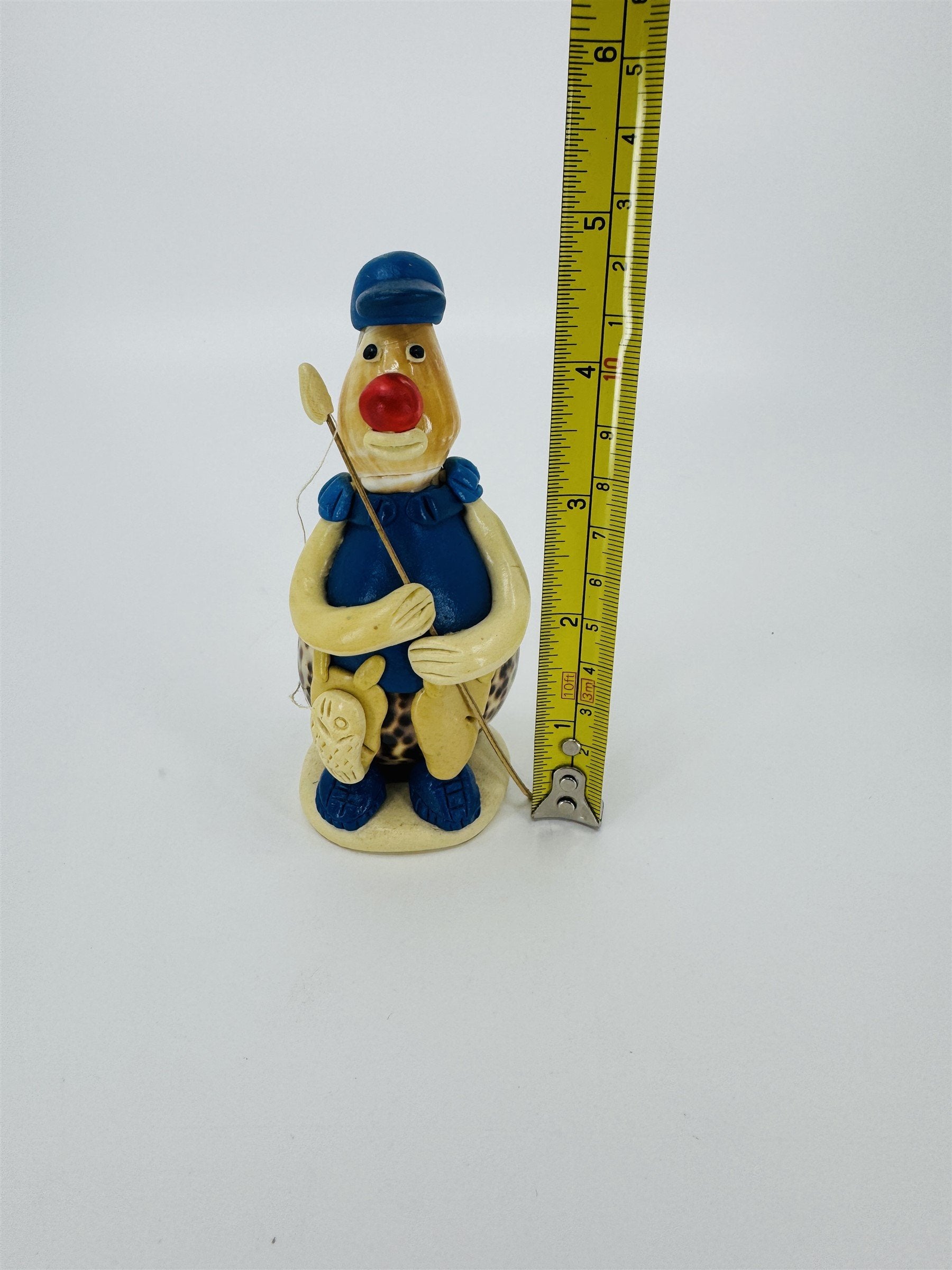 Vintage Sea Shell Art Figurine Fisherman Blue Shirt Made in Philippines