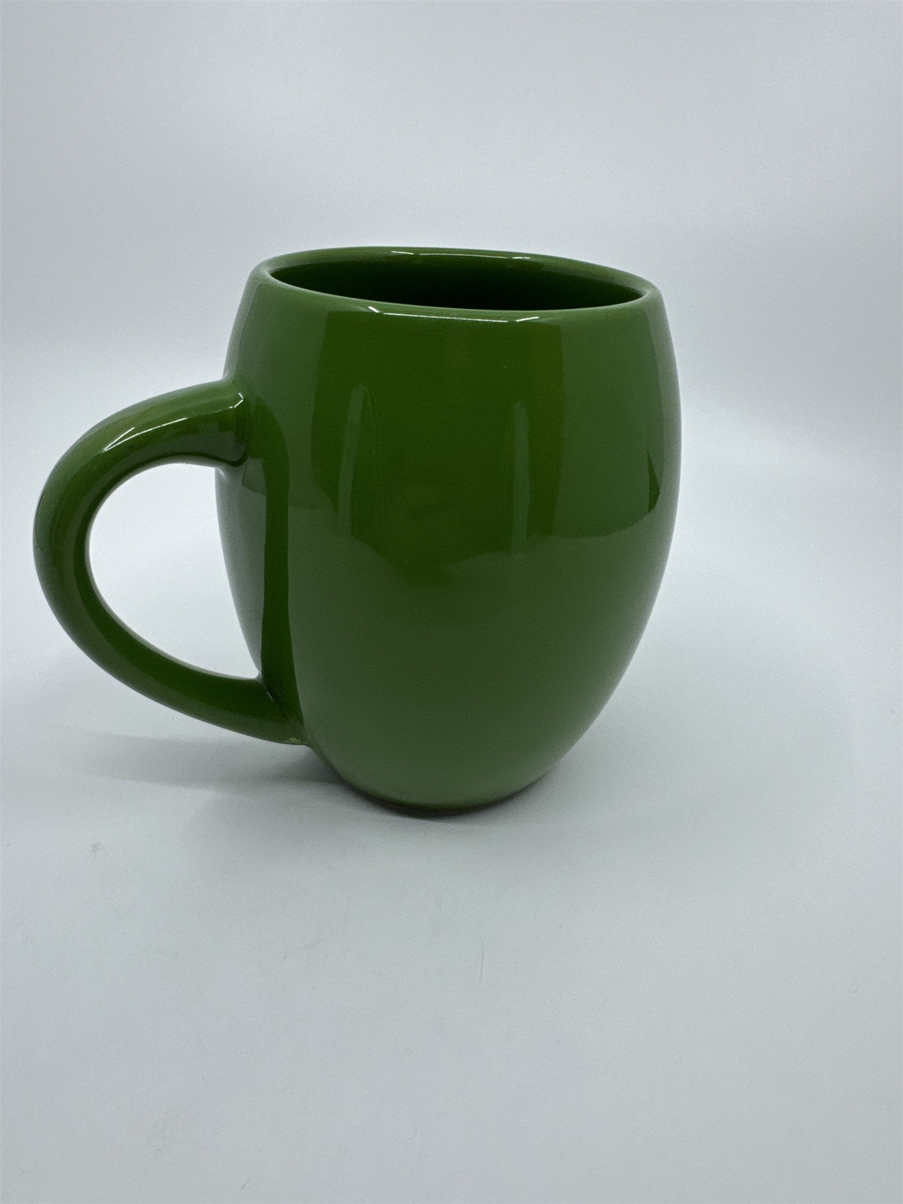 M&M World I Melt for No One Large 20oz Green Barrel Coffee Mug Cup (Chip/Crack)