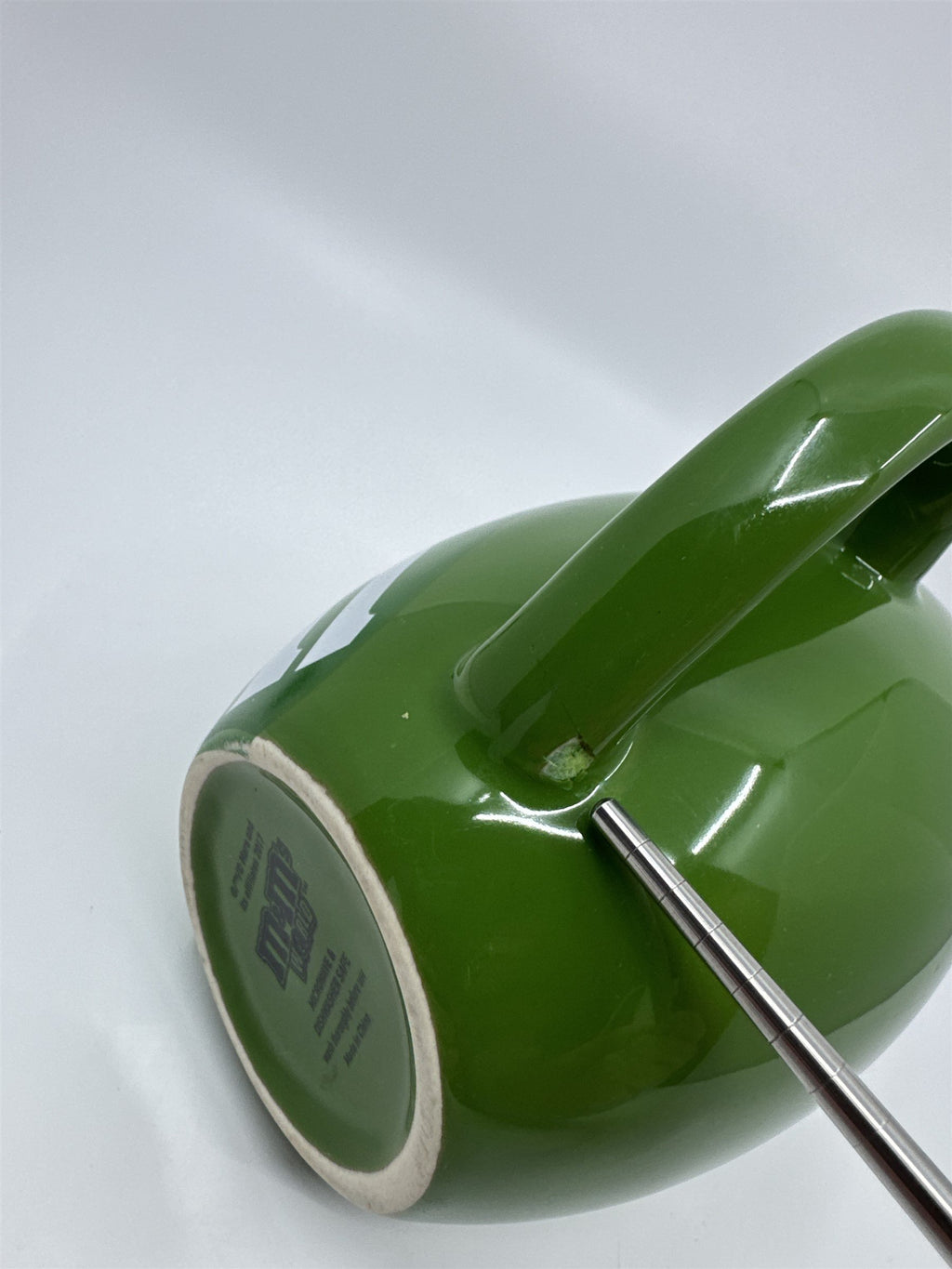 M&M World I Melt for No One Large 20oz Green Barrel Coffee Mug Cup (Chip/Crack)