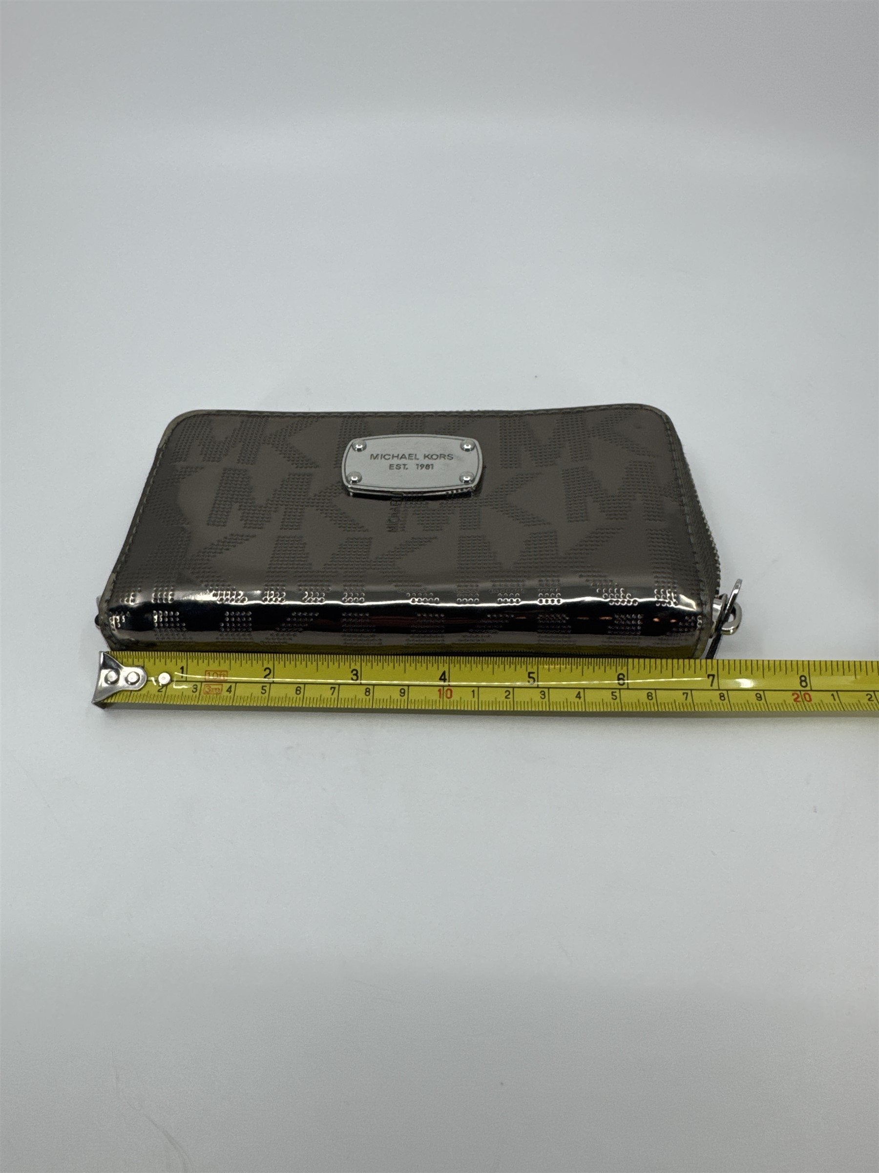 Michael Kors Signature Silver Gray Metallic Shiny Zippering Wallet Silver Accent