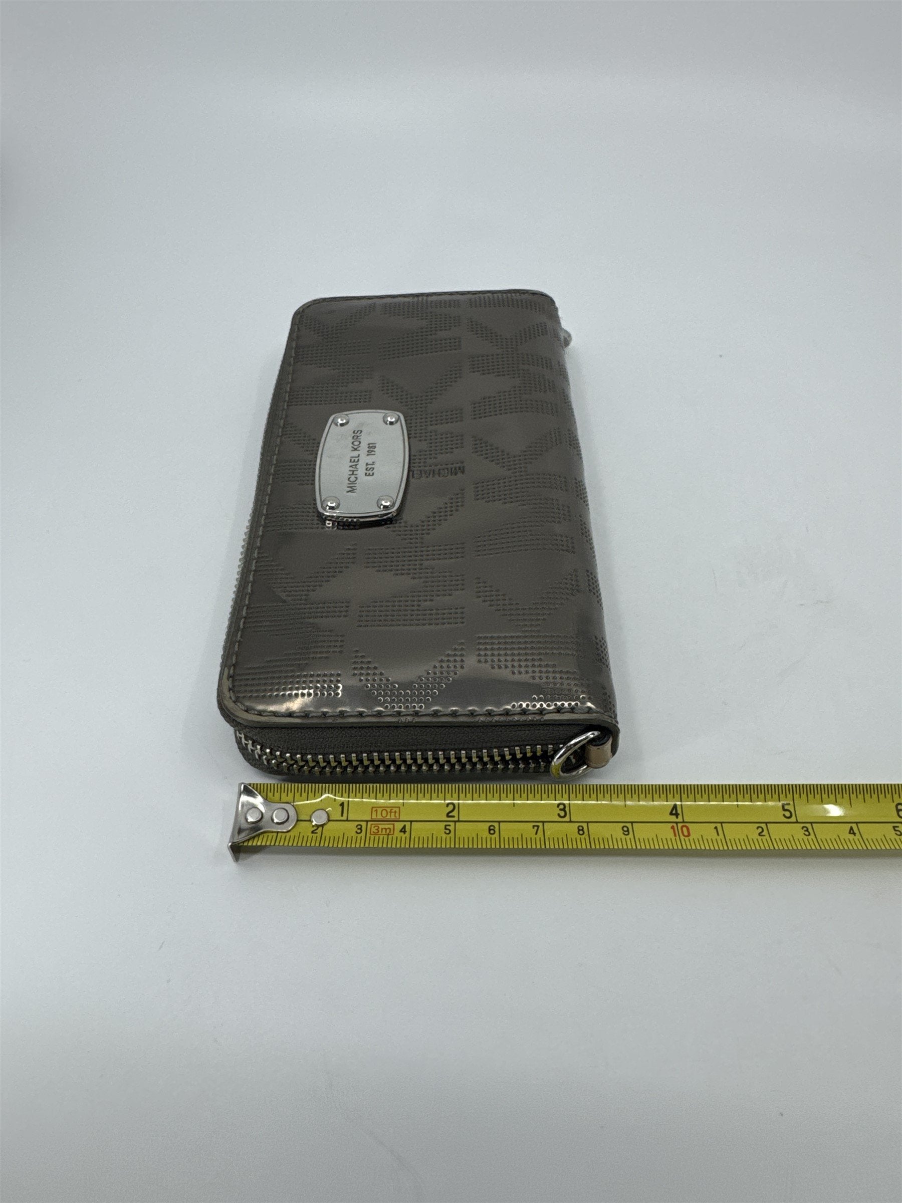 Michael Kors Signature Silver Gray Metallic Shiny Zippering Wallet Silver Accent
