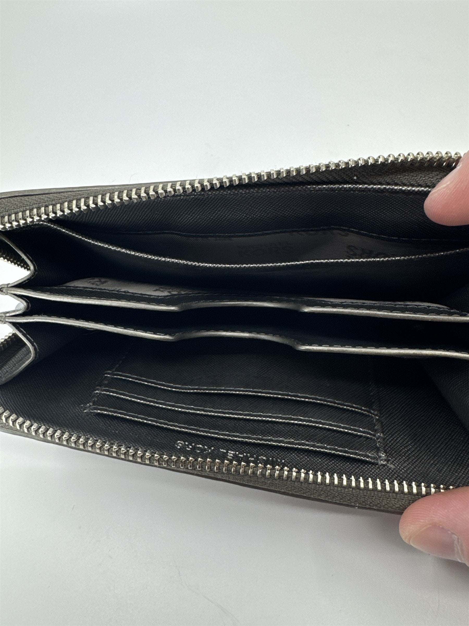 Michael Kors Signature Silver Gray Metallic Shiny Zippering Wallet Silver Accent