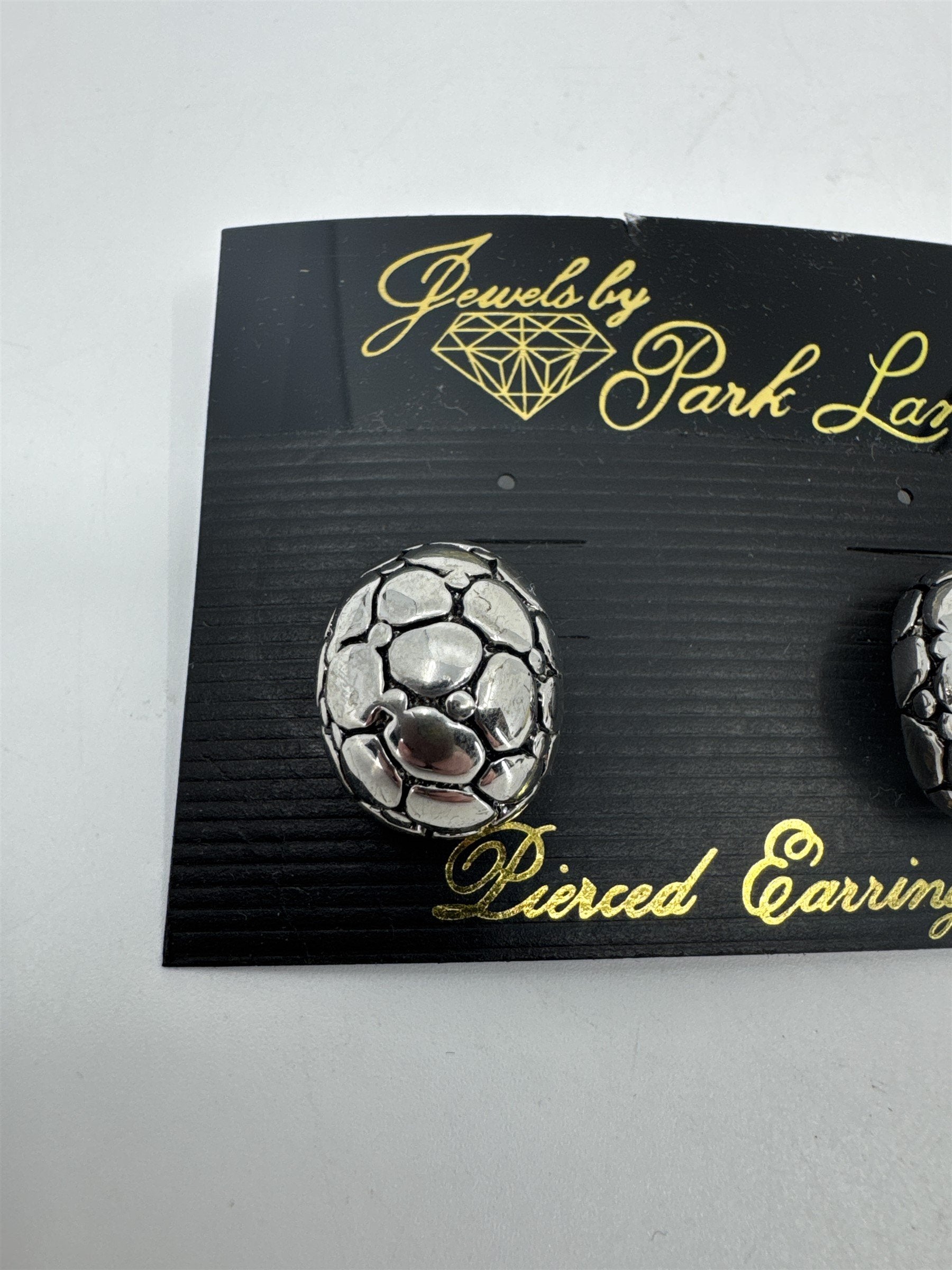 Jewels by Park Lane Silver Tone Alligator Textured Pierced Earrings *Discoloring