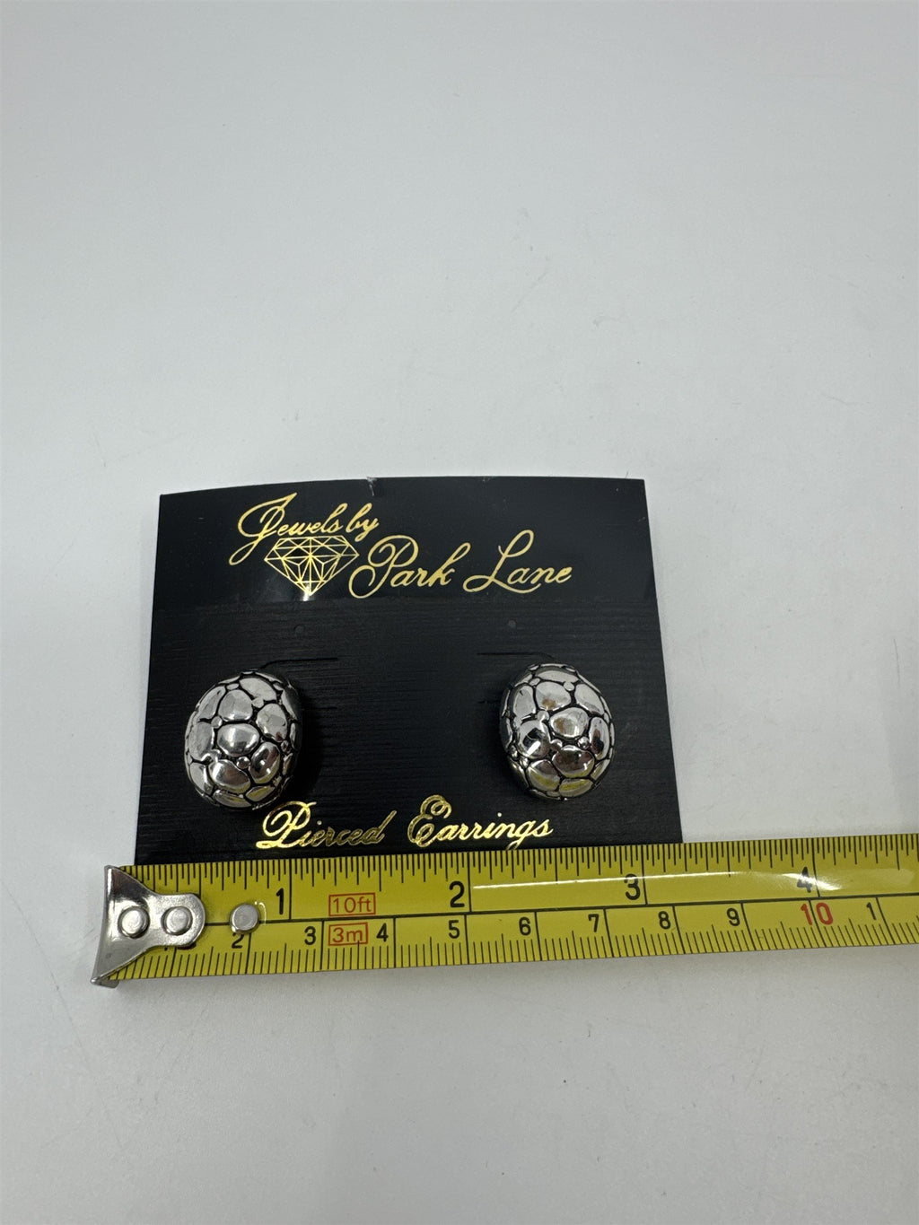 Jewels by Park Lane Silver Tone Alligator Textured Pierced Earrings *Discoloring