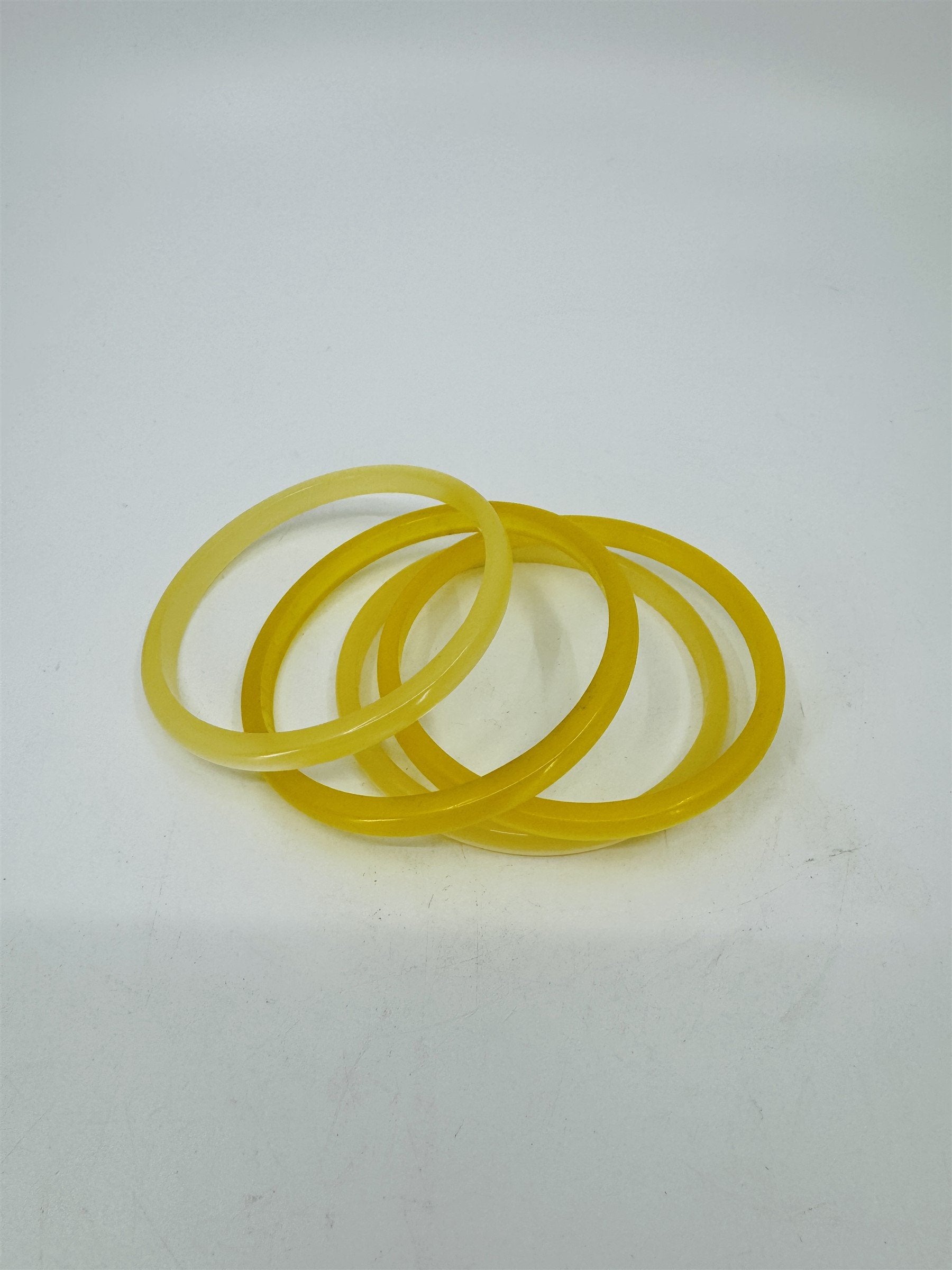 Vintage Set of 4 Celluloid/Resin 3" Bangle Bracelets Spacers Shiny Yellow