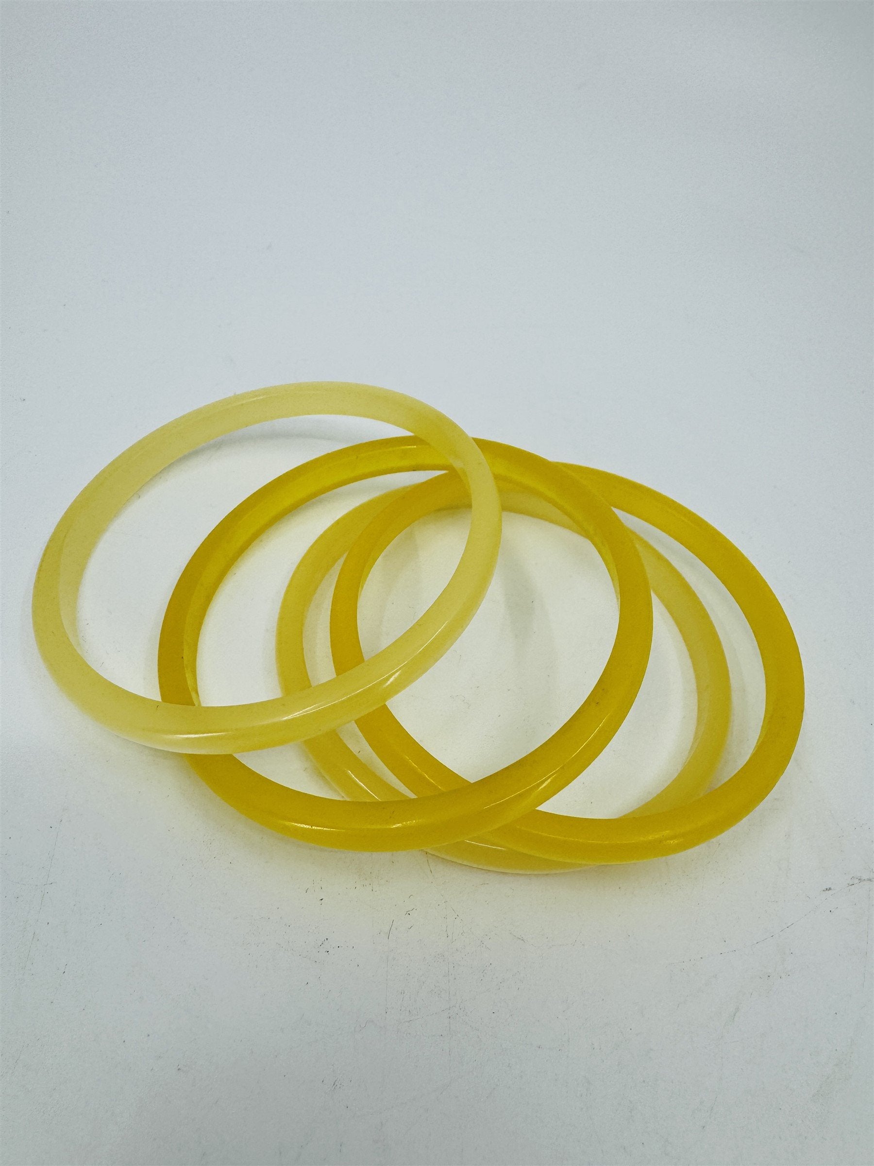 Vintage Set of 4 Celluloid/Resin 3" Bangle Bracelets Spacers Shiny Yellow