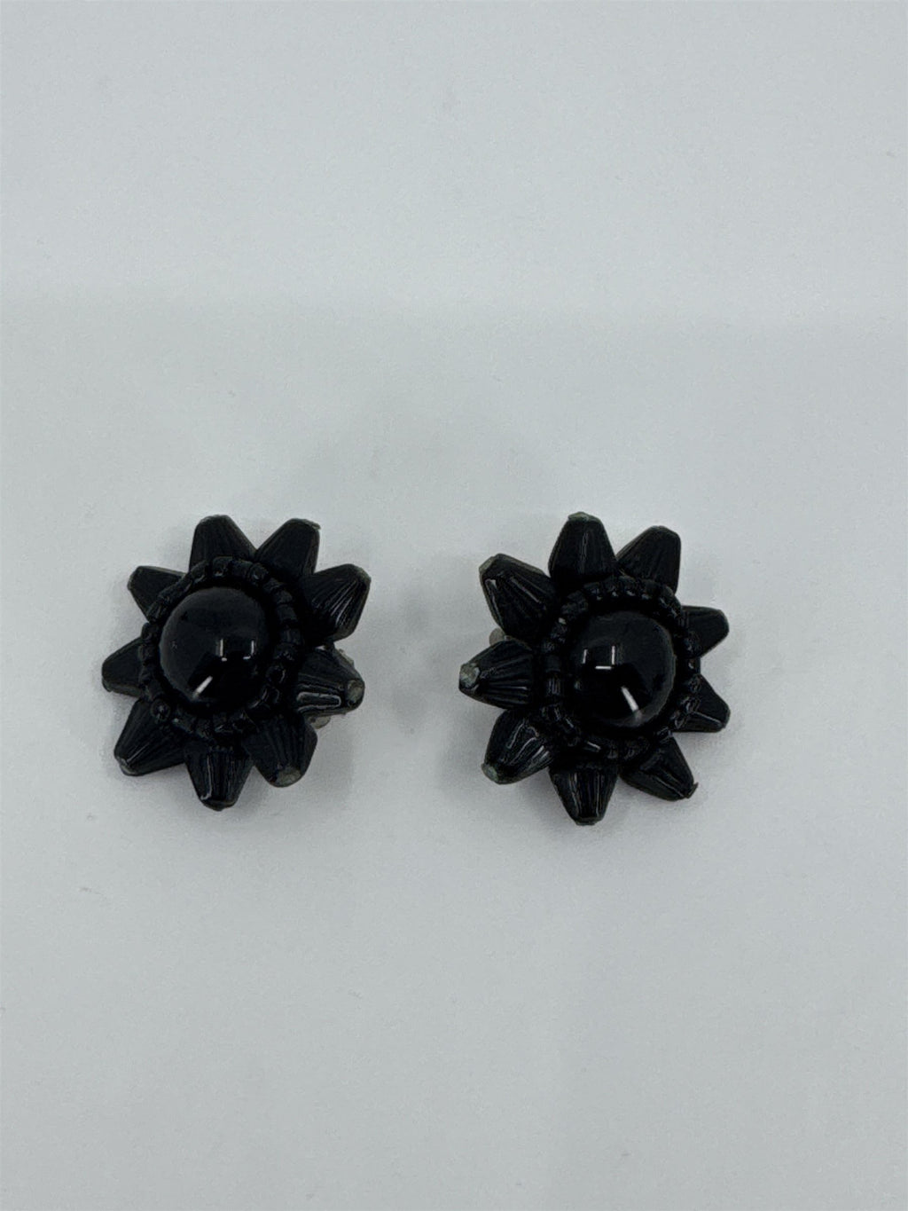 Vintage Costume Jewelry Japan Black Star Onyx Clip-On Earrings Dome Black Glass