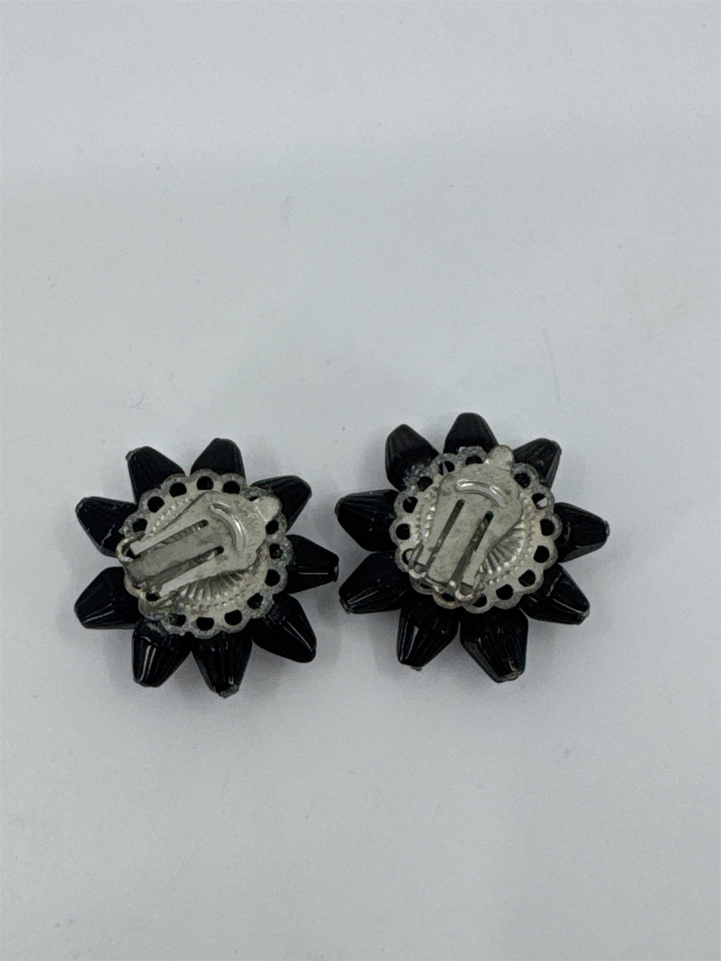 Vintage Costume Jewelry Japan Black Star Onyx Clip-On Earrings Dome Black Glass