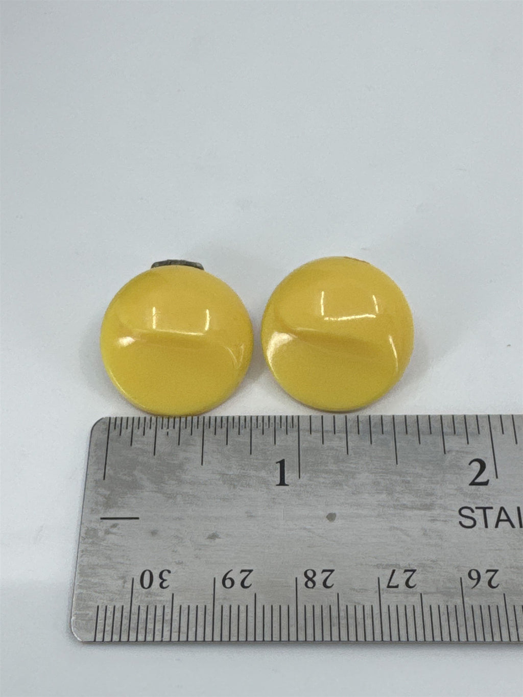 Vintage Costume Jewelry Yellow Resin Textured Swirl Circular Clip-On Earrings