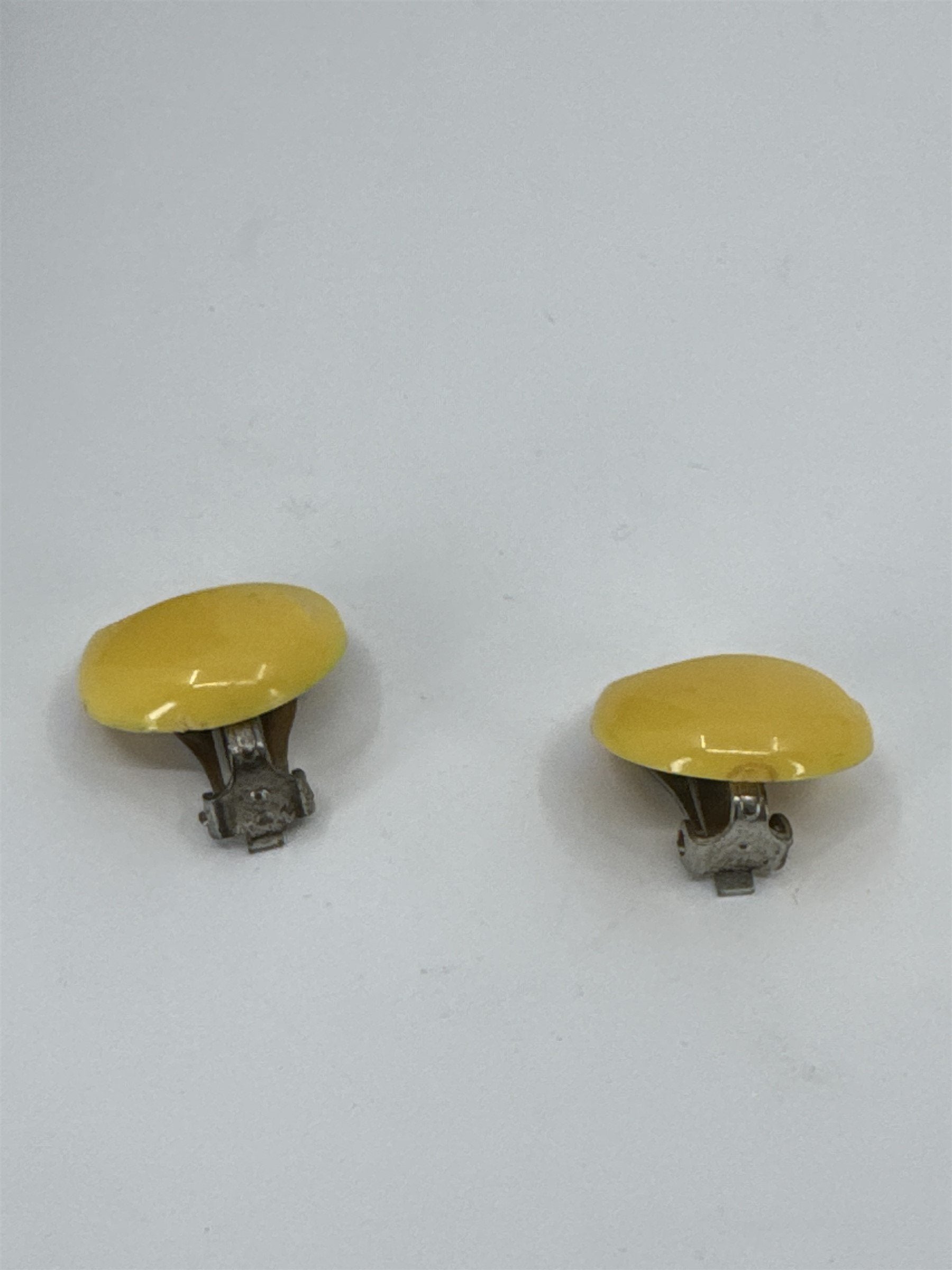 Vintage Costume Jewelry Yellow Resin Textured Swirl Circular Clip-On Earrings