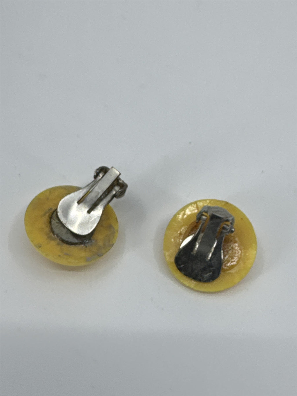 Vintage Costume Jewelry Yellow Resin Textured Swirl Circular Clip-On Earrings