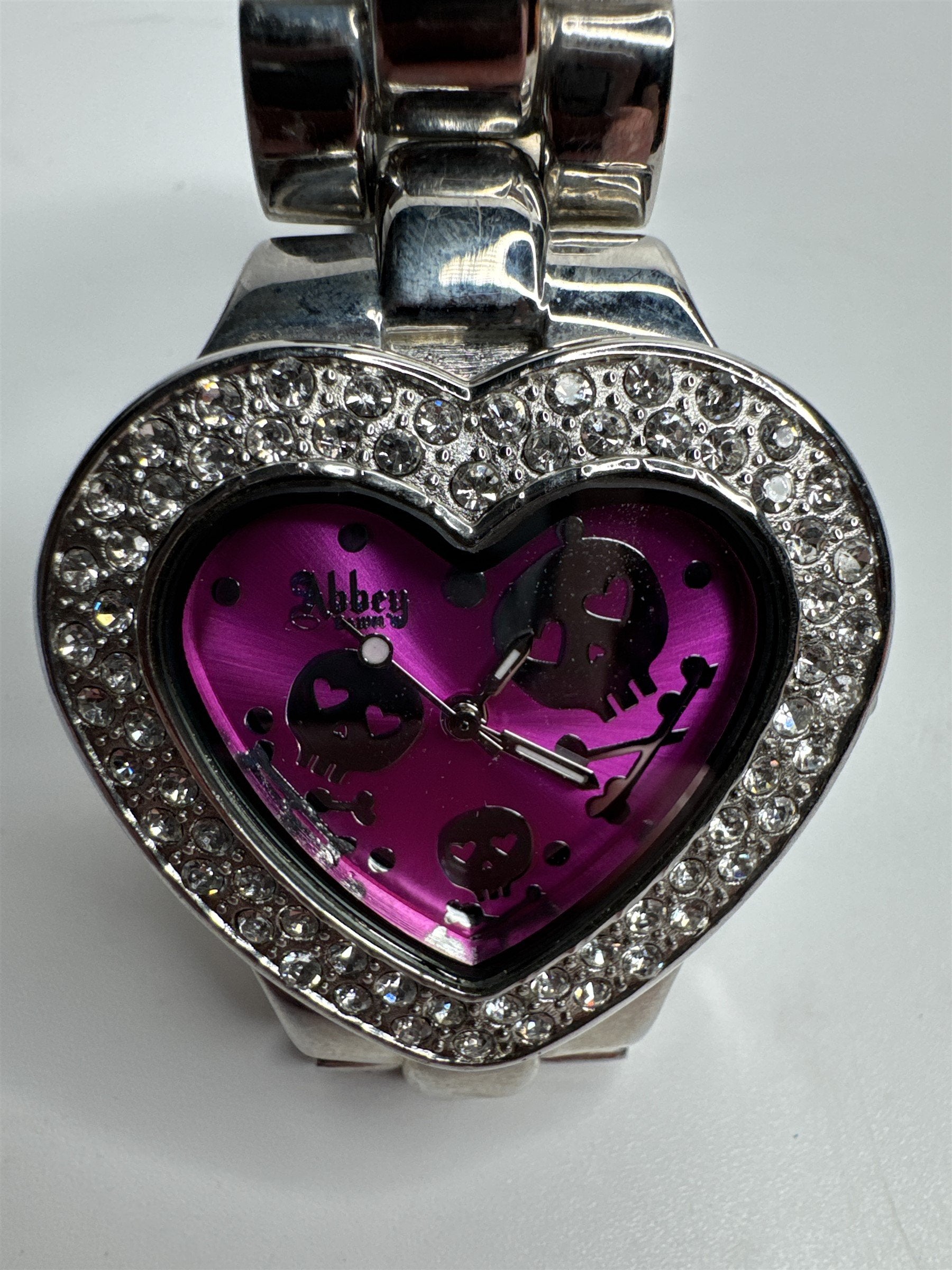 Abbey Stainless Steel Rhinestone and Pink Crossbones Heart Skulls Wristwatch