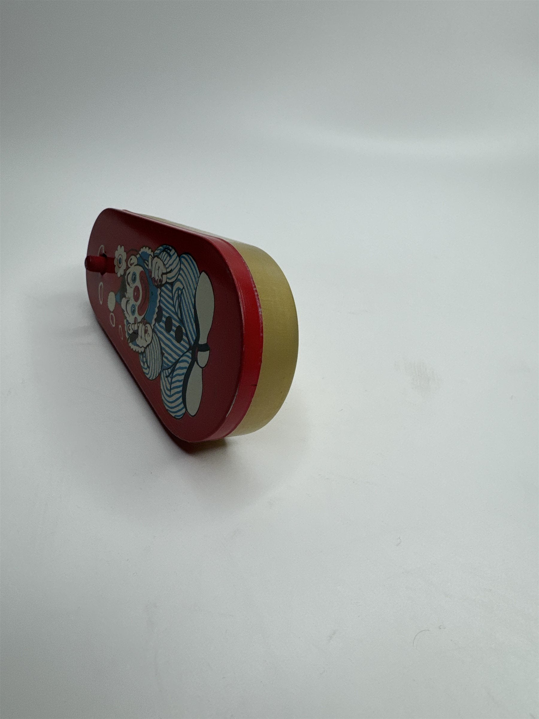 Vintage 1950s Tin Litho Winding Noisemaker USA Cigar Smoke Rings Clown Flower