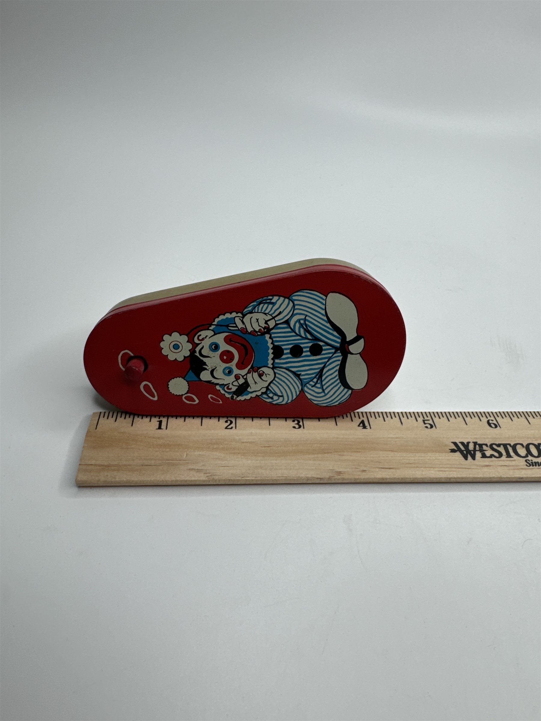 Vintage 1950s Tin Litho Winding Noisemaker USA Cigar Smoke Rings Clown Flower