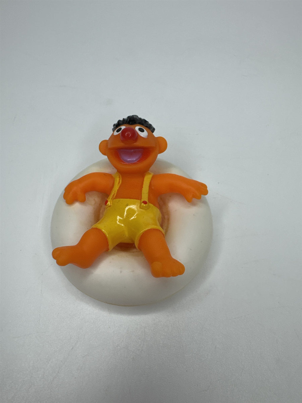 Sesame Street ERNIE PVC Figure on Plastic Inner Tube Float 2.5" Marks/Cracked