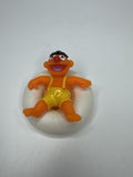 Sesame Street ERNIE PVC Figure on Plastic Inner Tube Float 2.5" Marks/Cracked