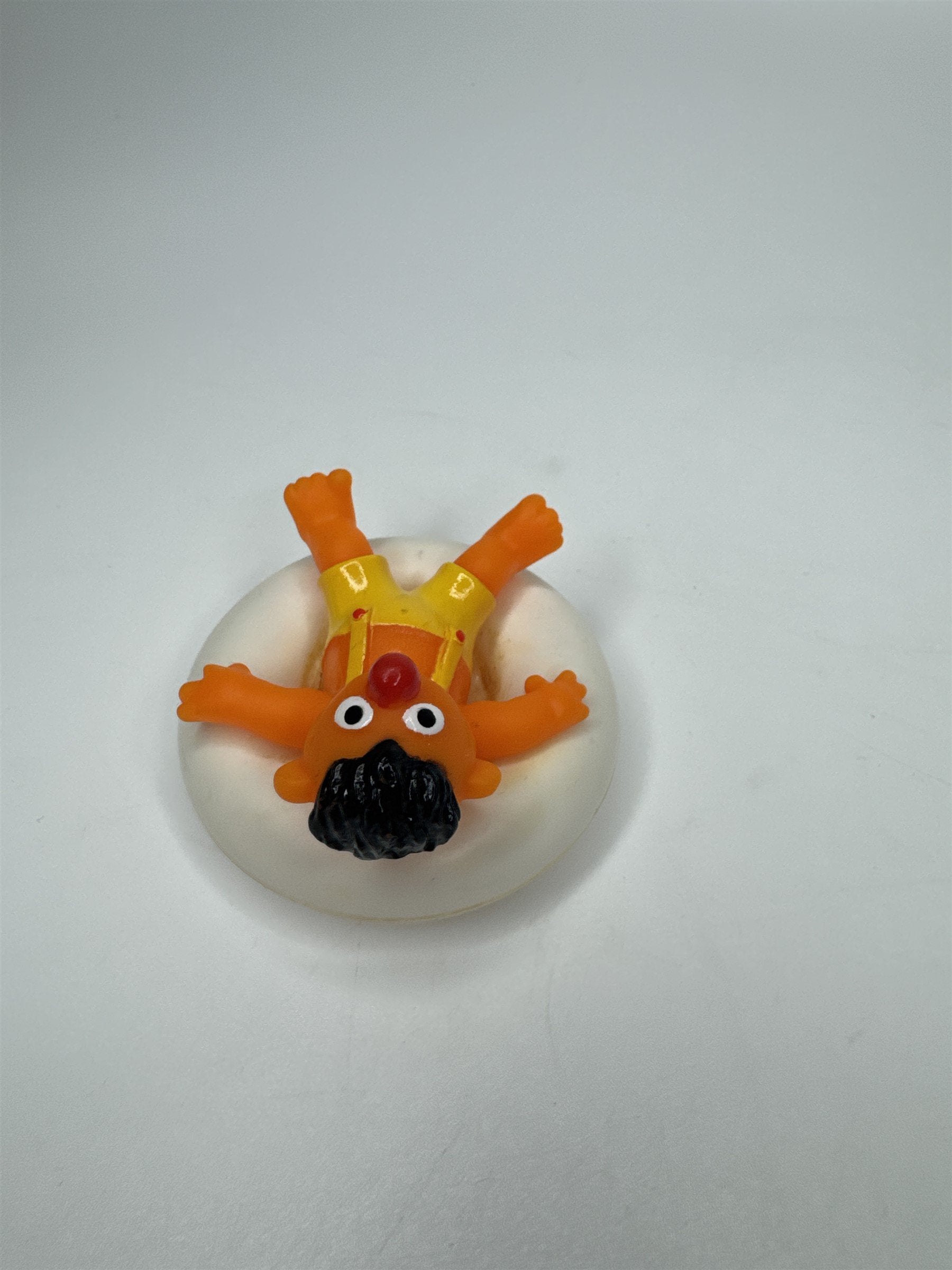 Sesame Street ERNIE PVC Figure on Plastic Inner Tube Float 2.5" Marks/Cracked