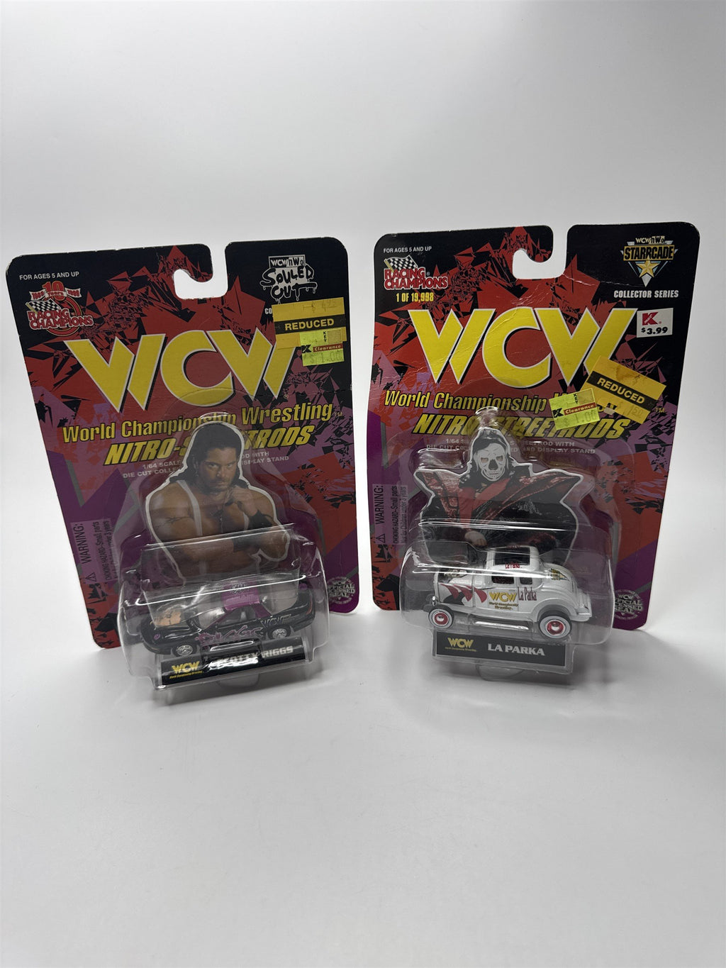 Set of Two Vintage Racing Champions WCW Scotty Riggs La Parka Toy Racecar