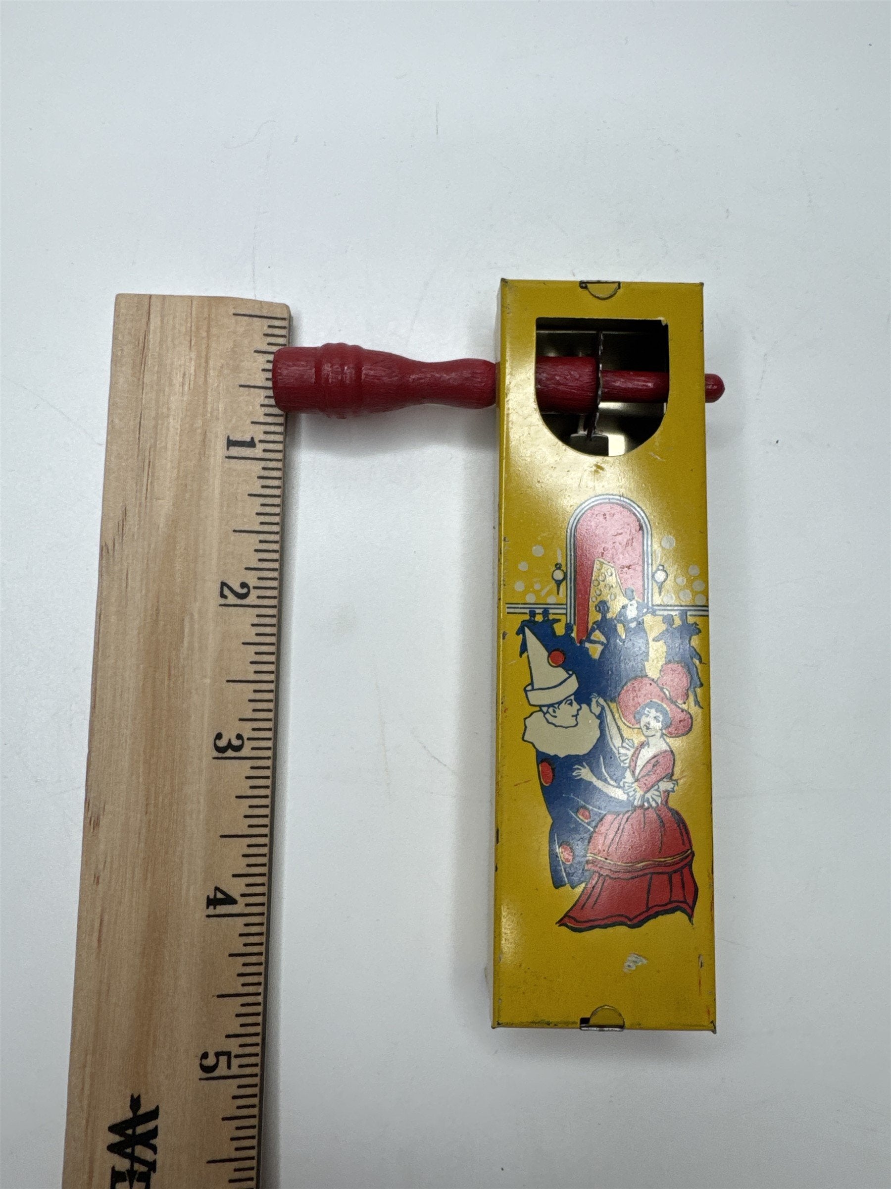 Vintage 1928 Kirchhoff Wooden Handle Tin Noisemaker with Dancers