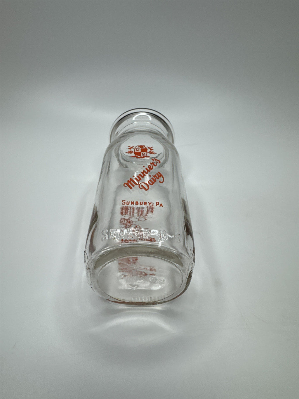 Minnier's Dairy Sunbury PA Empty Half Pint Milk Glass Jug Playtime Orange Print