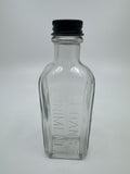Vintage Sloan's Liniment Embossed Glass Bottle with Black Twist Cap
