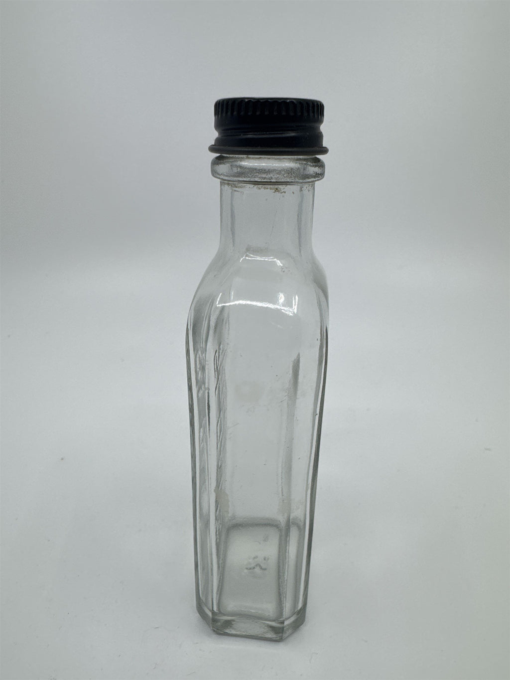Vintage Sloan's Liniment Embossed Glass Bottle with Black Twist Cap