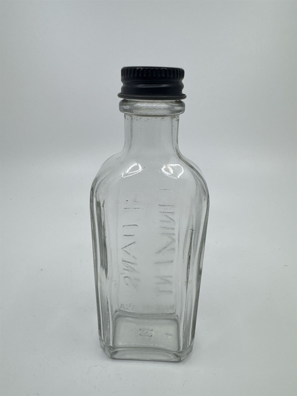 Vintage Sloan's Liniment Embossed Glass Bottle with Black Twist Cap