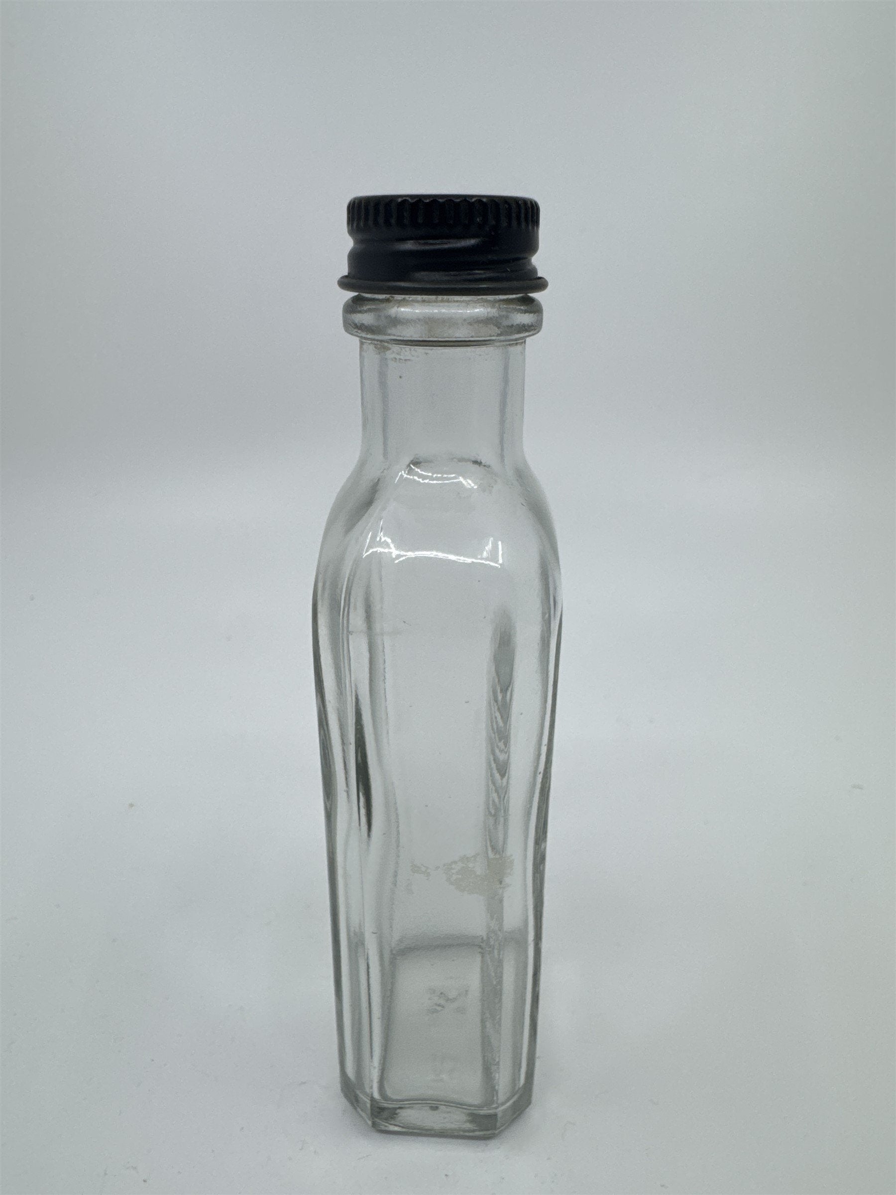 Vintage Sloan's Liniment Embossed Glass Bottle with Black Twist Cap